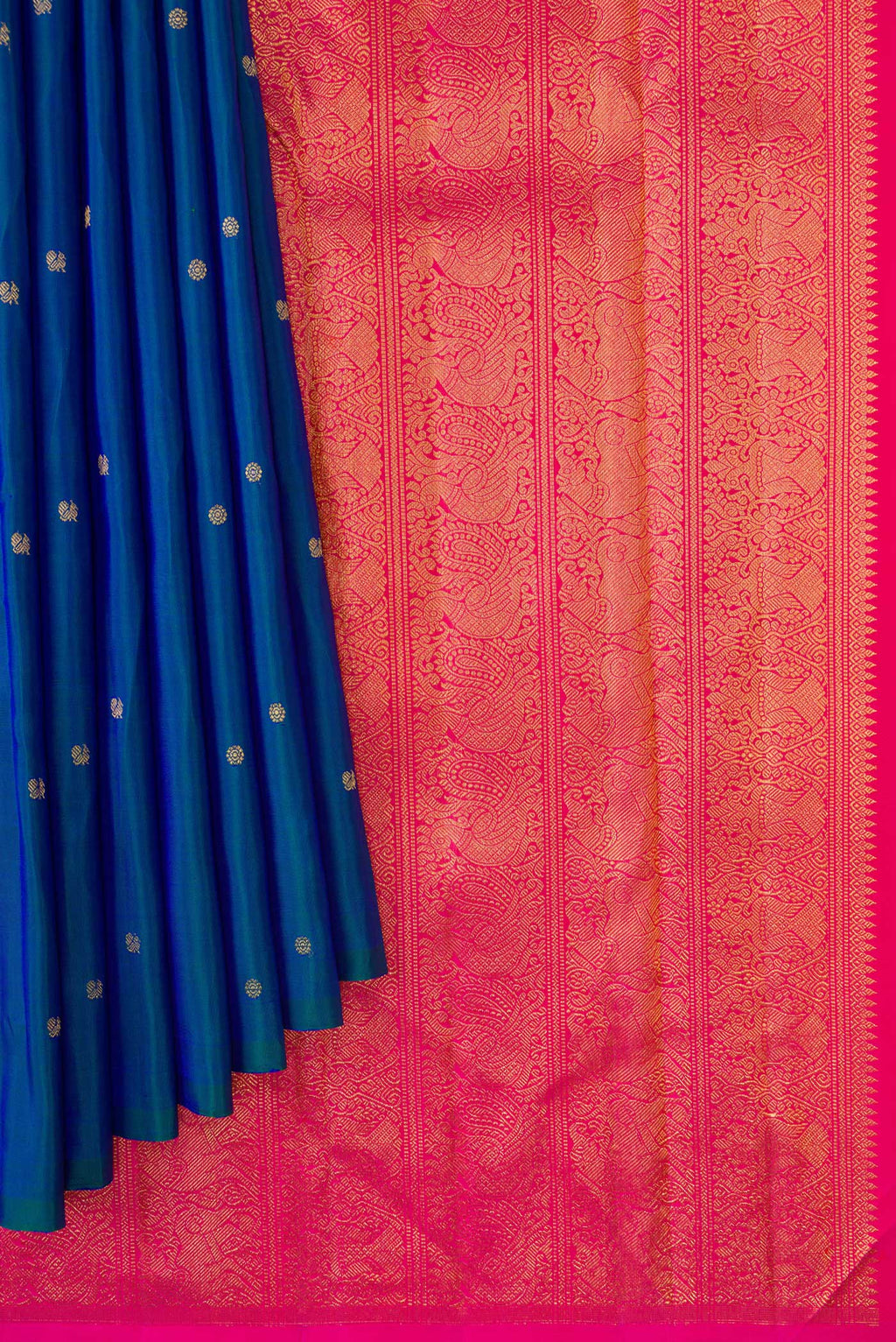 Pleats and pallu of Peacock Blue Dual Tone Kanjivaram Silk Saree with Zari Butta on the body and Without Border. 