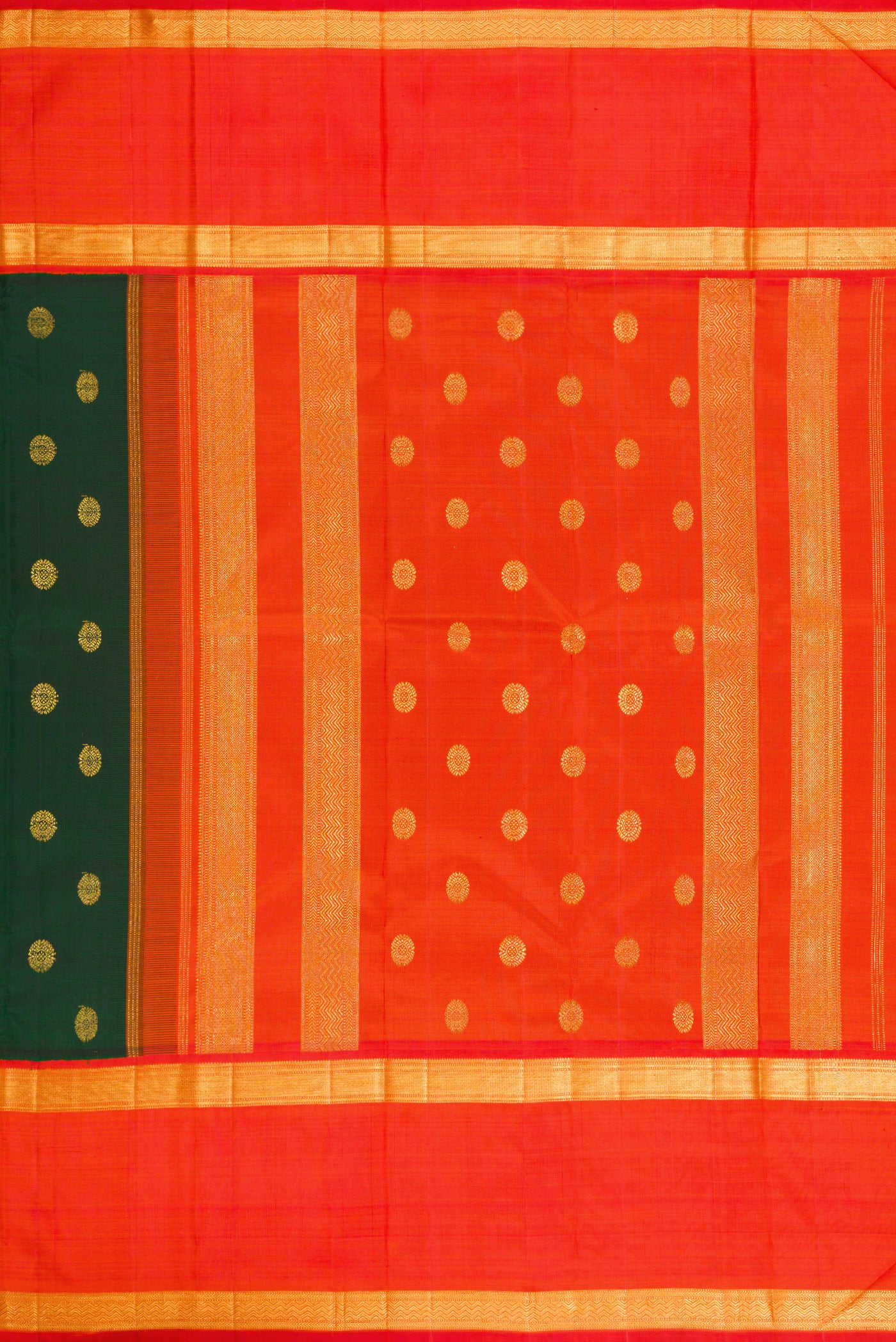 Close up image of the pallu of Bottle Green Dual Tone Kanchipuram Silk Saree with Zari Butta on the body and Zari Border. 