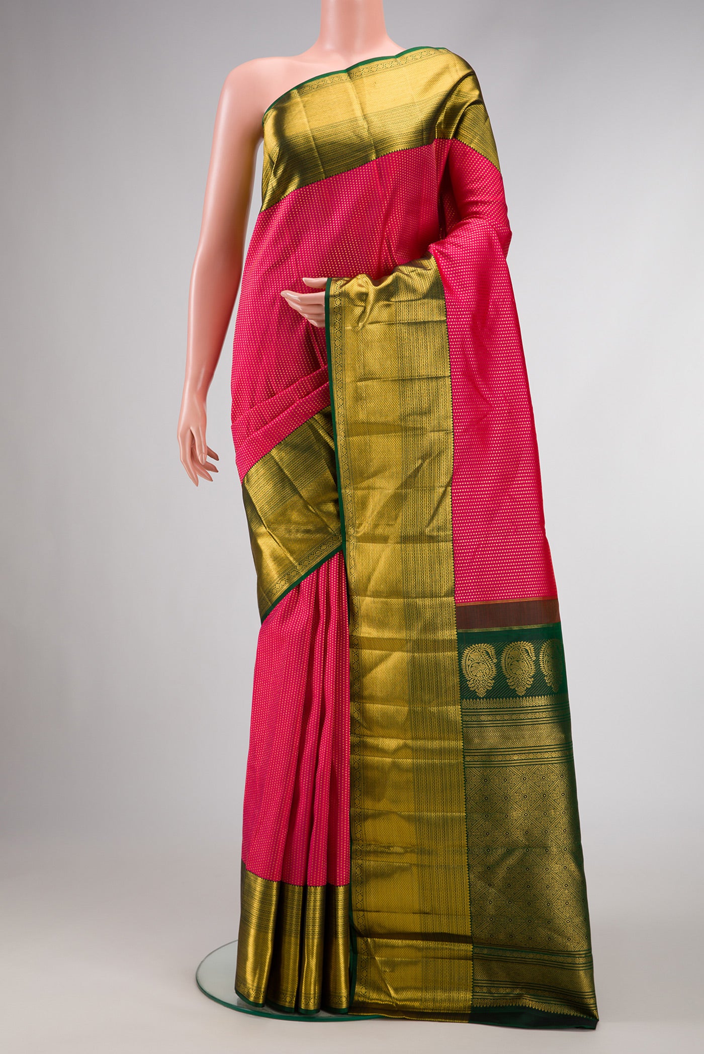 Dark Pink Dual Tone Kanchipuram Silk Saree with Zari Brocade on the body and Zari Border.  displayed on a mannequin