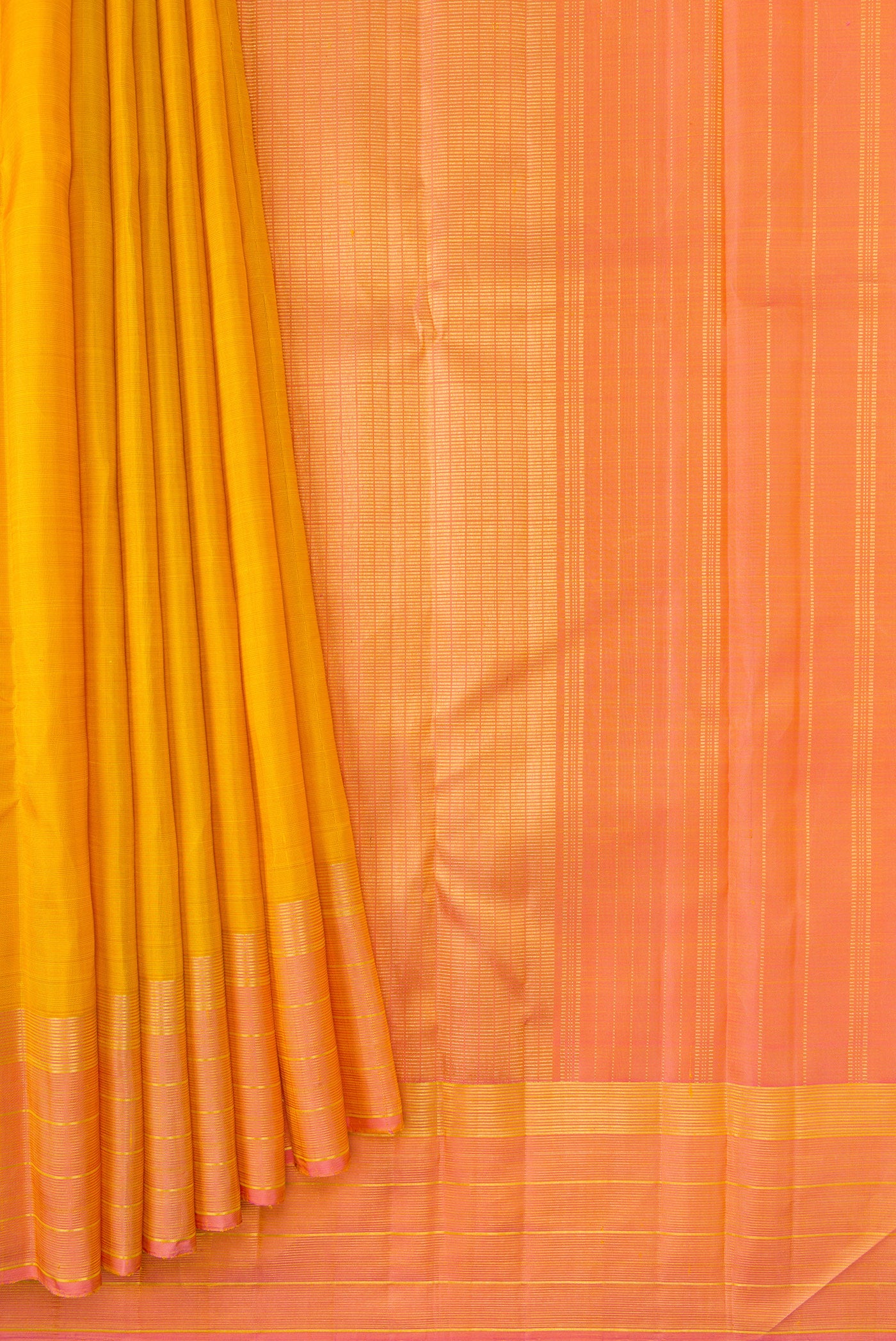 Pleats and pallu of Yellow Dual Tone Kanjivaram Silk Saree with Checked design on the body and Zari Border. 