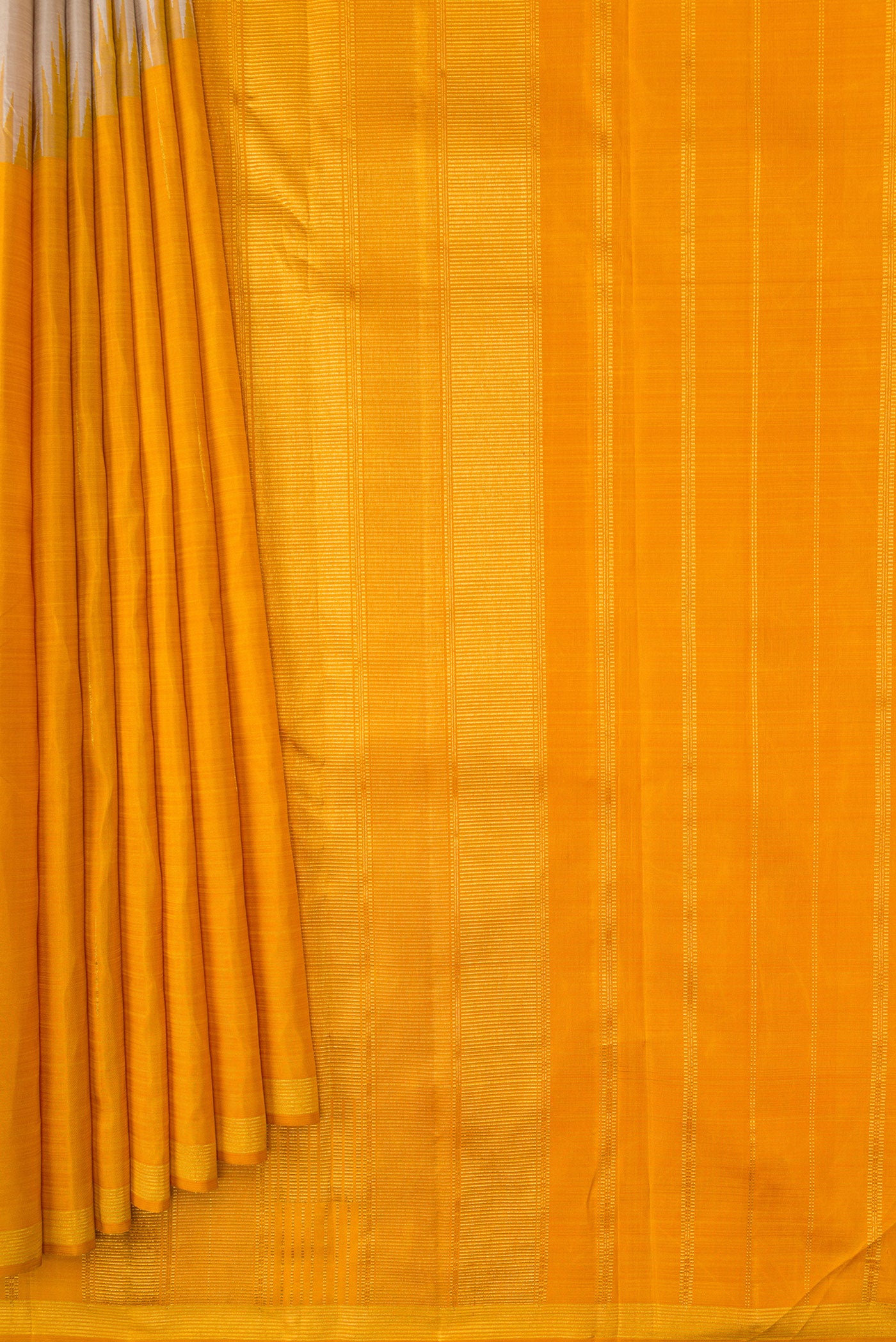Pleats and pallu of Beige and Mustard Color Kanjivaram Silk Saree with Half And Half on the body and Thin Zari Line. 