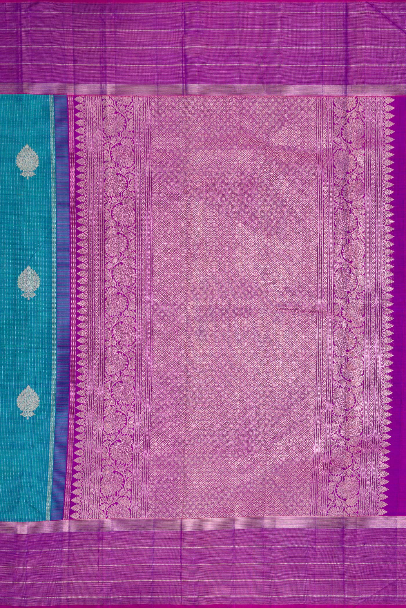 Close up image of the pallu of Peacock Blue Dual Tone Kanjivaram Silk Saree with Zari Butta on the body and Zari Border. 