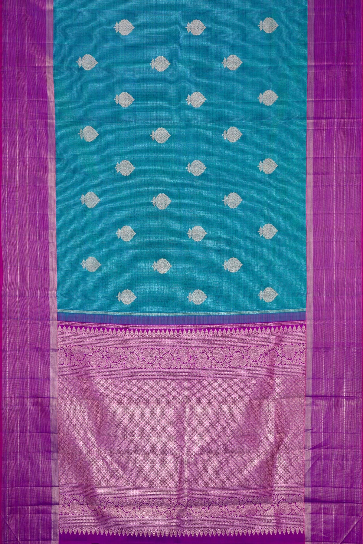 Flat view of Peacock Blue Dual Tone Kanjivaram Silk Saree with Zari Butta on the body and Zari Border. 