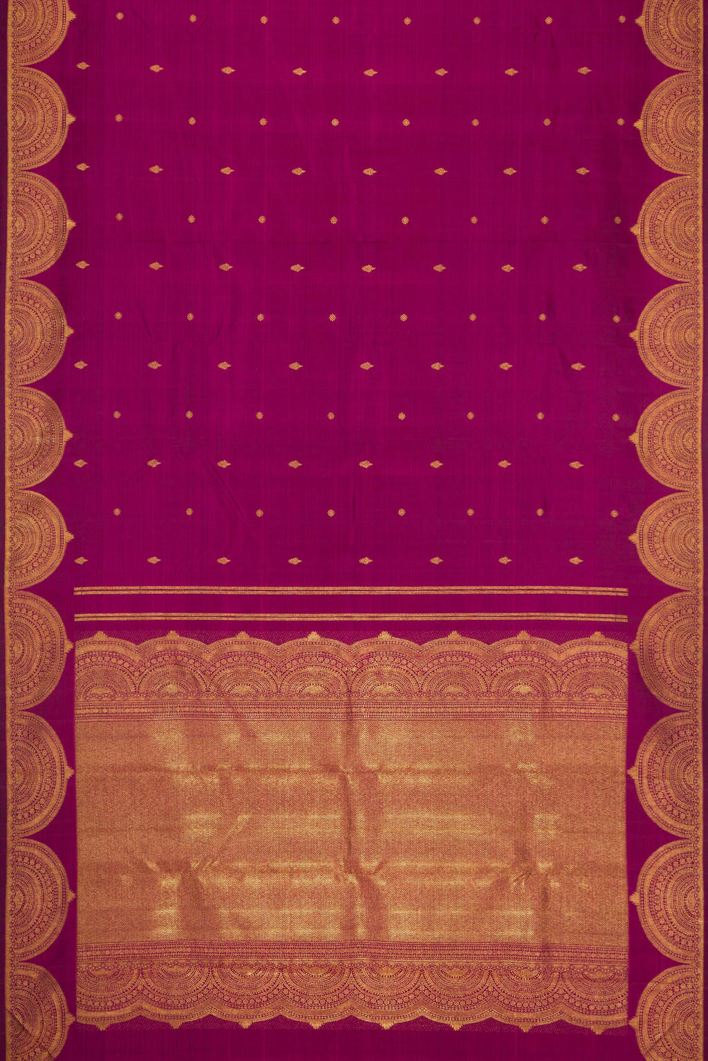 Flat view of Magenta Dual Tone Kanjivaram Silk Saree with Zari Butta on the body and Fancy Border. 