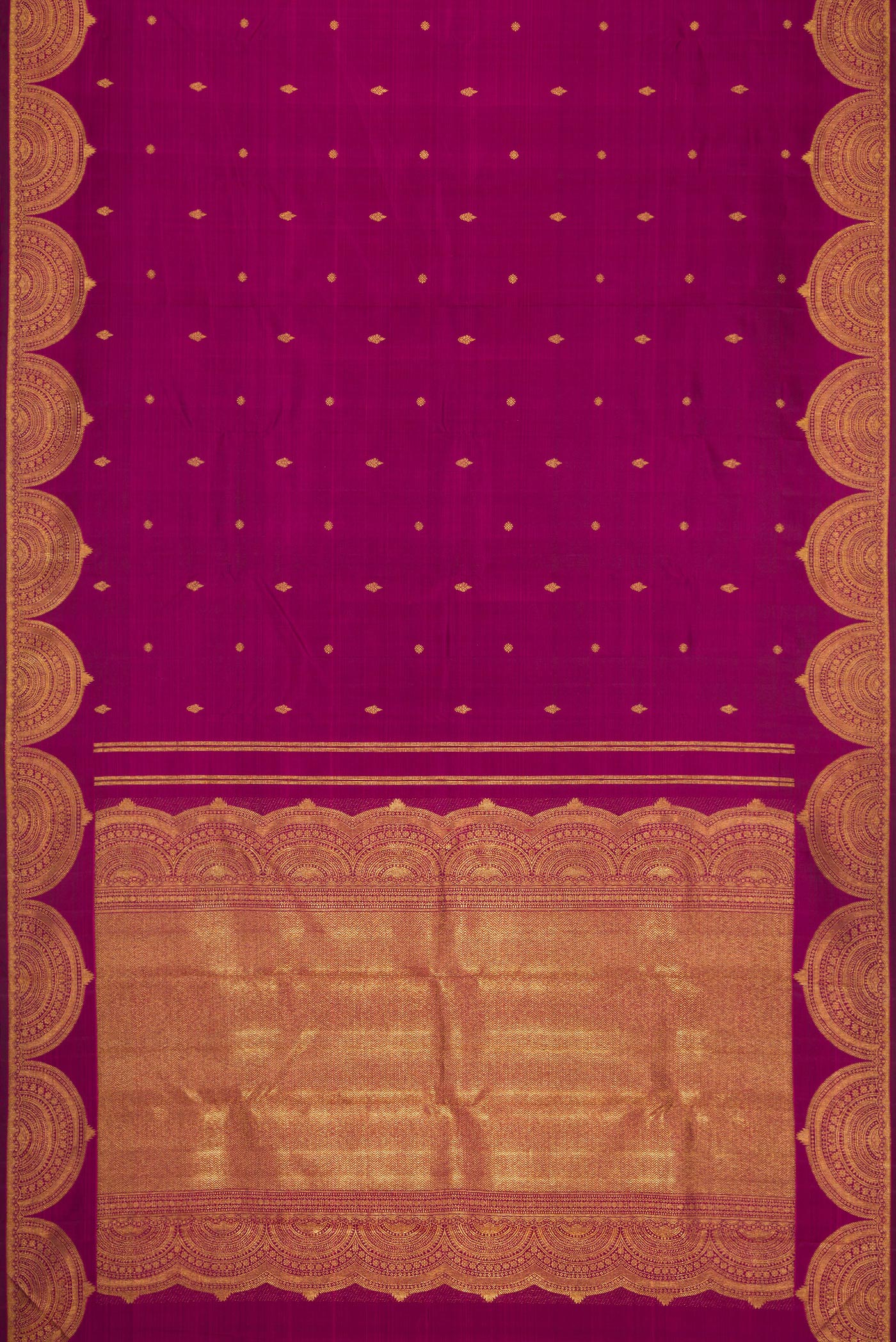 Flat view of Magenta Dual Tone Kanjivaram Silk Saree with Zari Butta on the body and Fancy Border. 