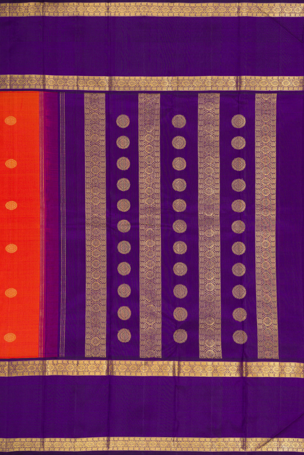 Close up image of the pallu of Orange Dual Tone Kanjivaram Silk Saree with Zari Butta on the body and Zari Border. 