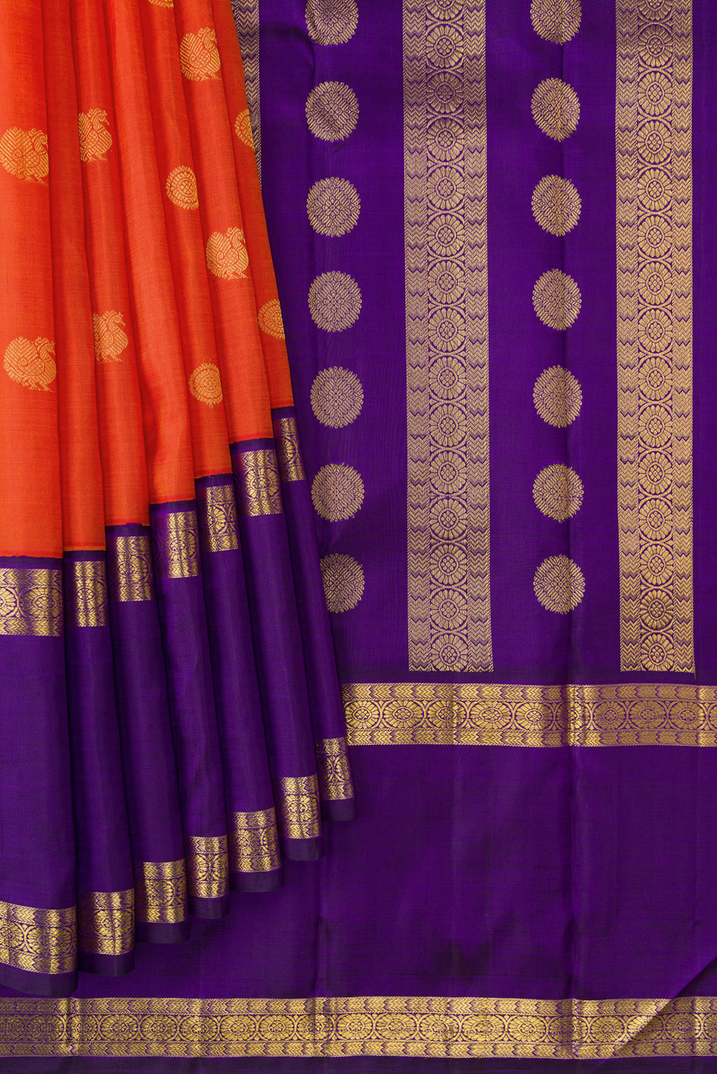 Pleats and pallu of Orange Dual Tone Kanjivaram Silk Saree with Zari Butta on the body and Zari Border. 