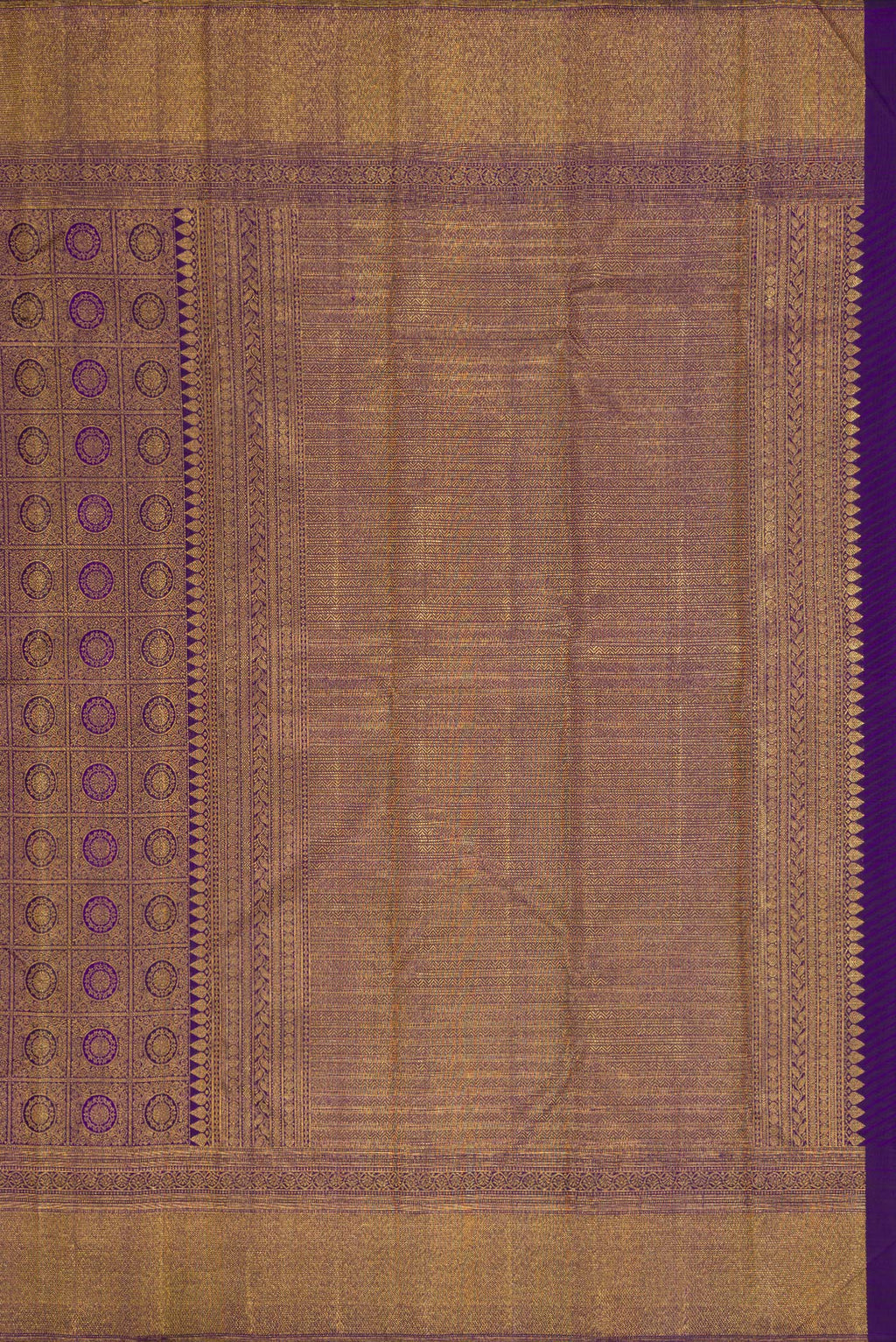 Close up image of the pallu of Violet Dual Tone Kanchipuram Silk Saree with Zari Brocade on the body and Zari Border. 