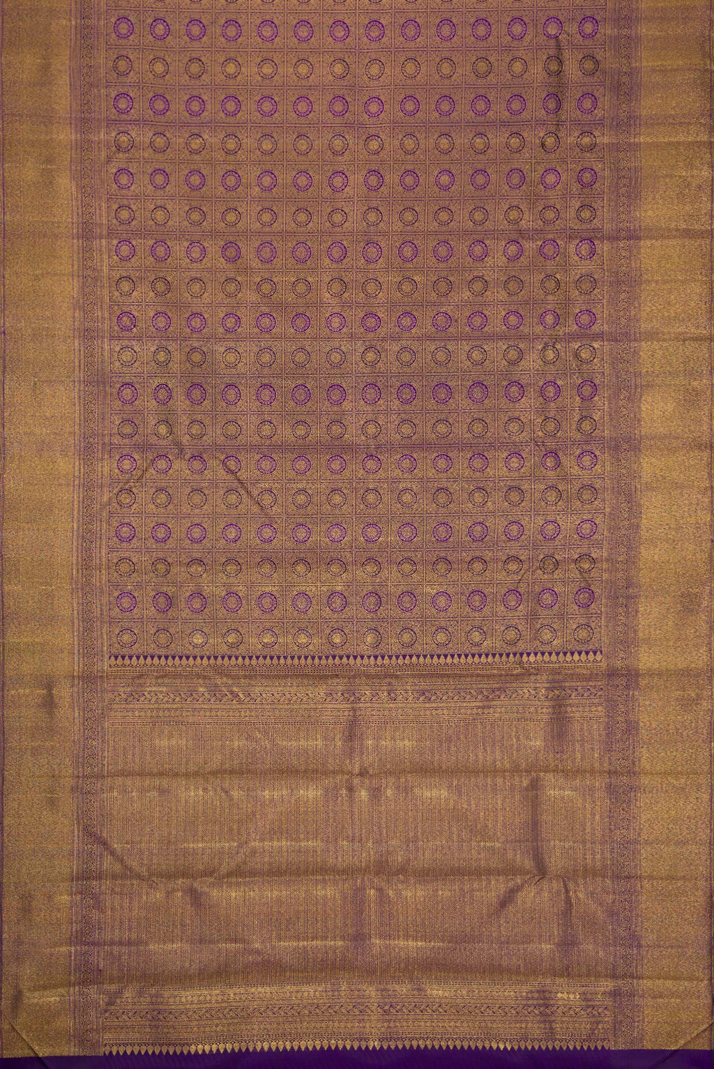 Flat view of Violet Dual Tone Kanchipuram Silk Saree with Zari Brocade on the body and Zari Border. 