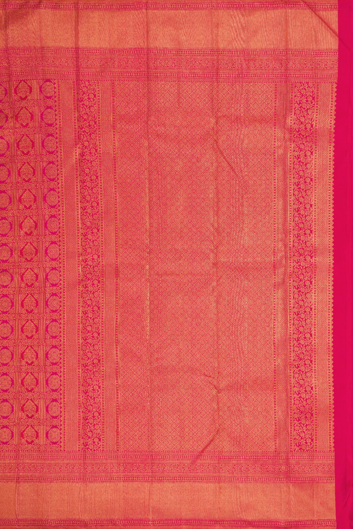 Close up image of the pallu of Dark Pink Dual Tone Kanchipuram Silk Saree with Zari Brocade on the body and Zari Border. 