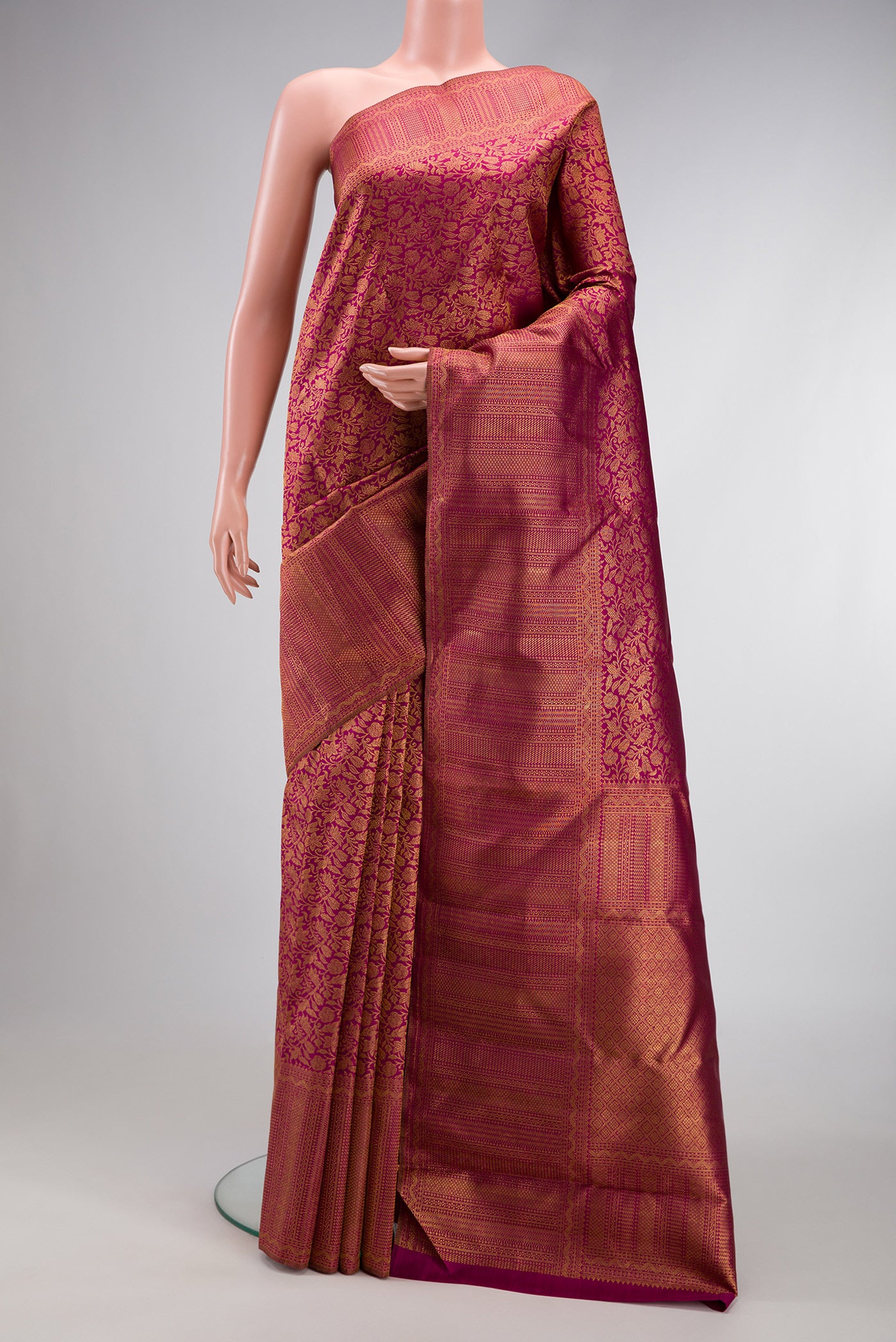 Purple Dual Tone Kanchipuram Silk Saree with Zari Brocade on the body and Zari Border.  displayed on a mannequin