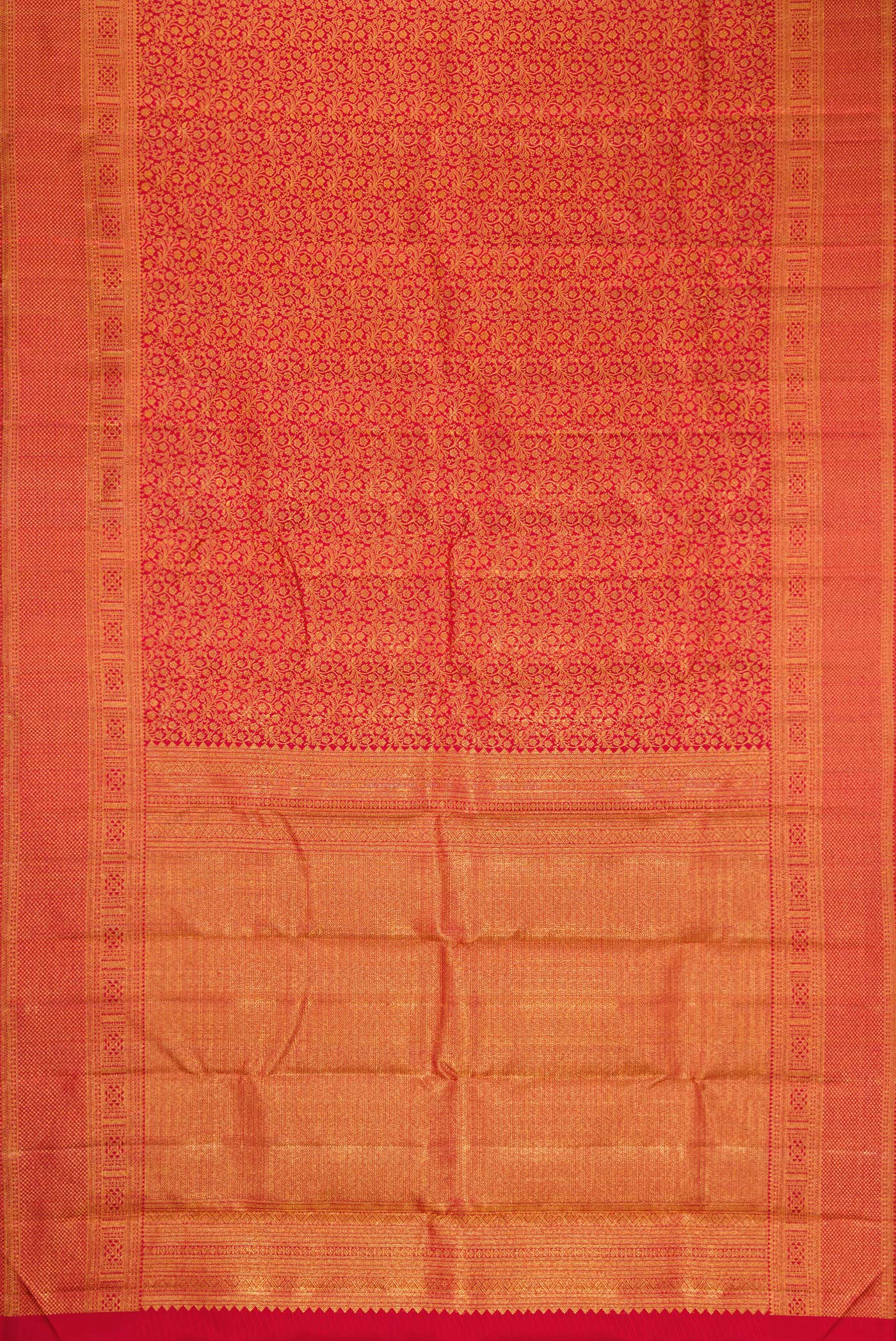 Flat view of Red Dual Tone Kanchipuram Silk Saree with Zari Brocade on the body and Zari Border. 