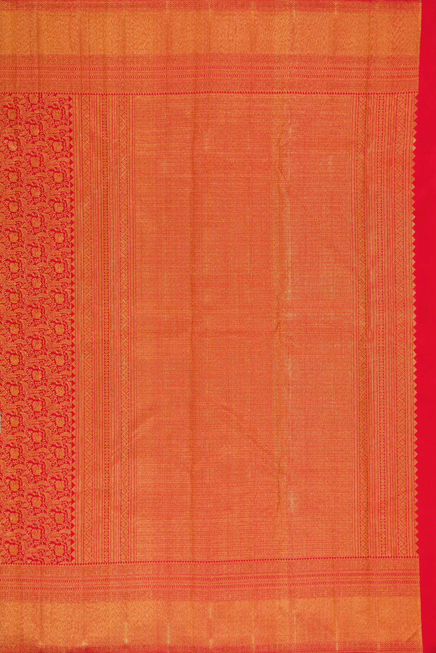 Close up image of the pallu of Red Dual Tone Kanchipuram Silk Saree with Zari Brocade on the body and Zari Border. 
