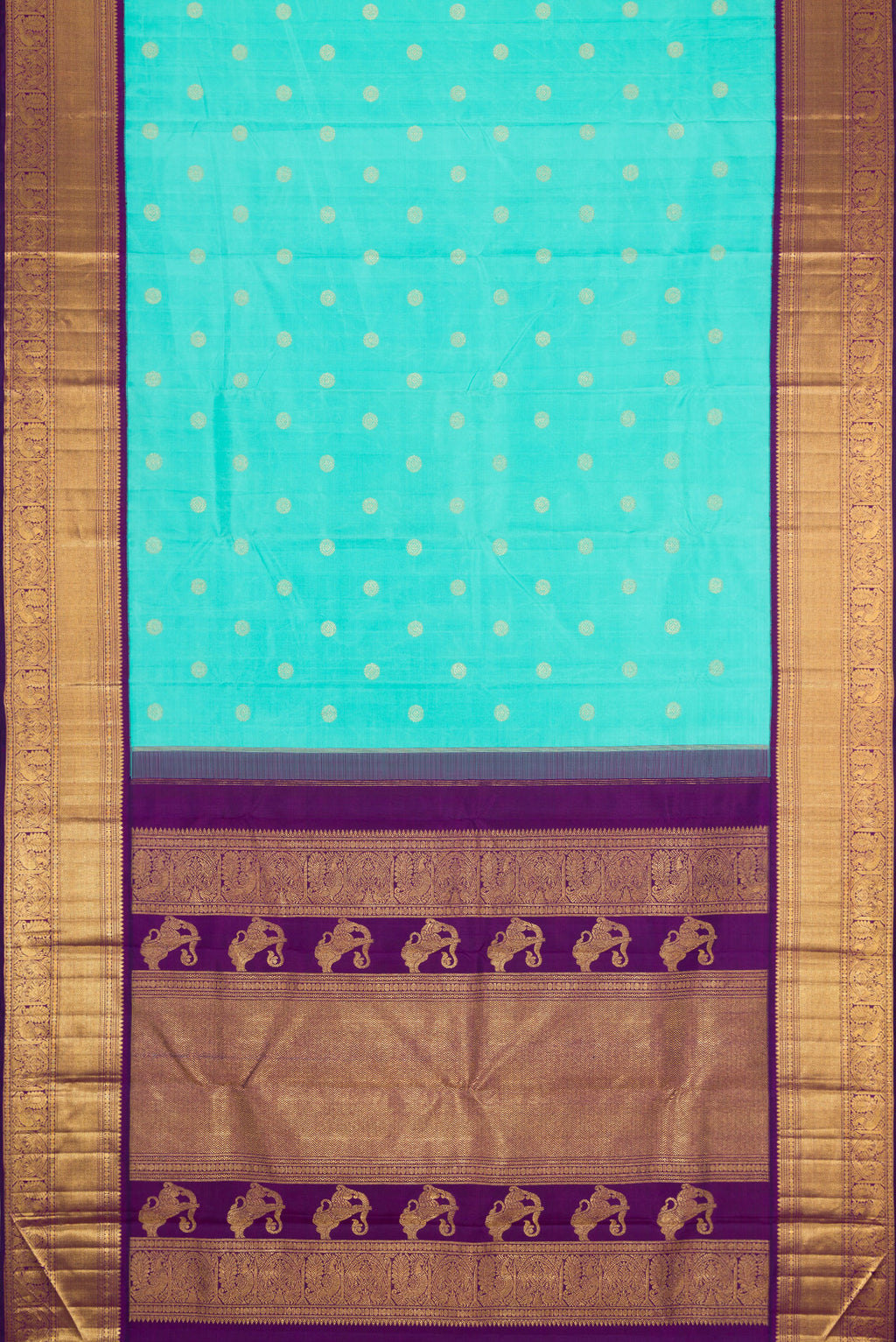 Flat view of Sky Blue Dual Tone Kanchipuram Silk Saree with Zari Butta on the body and Zari Border. 