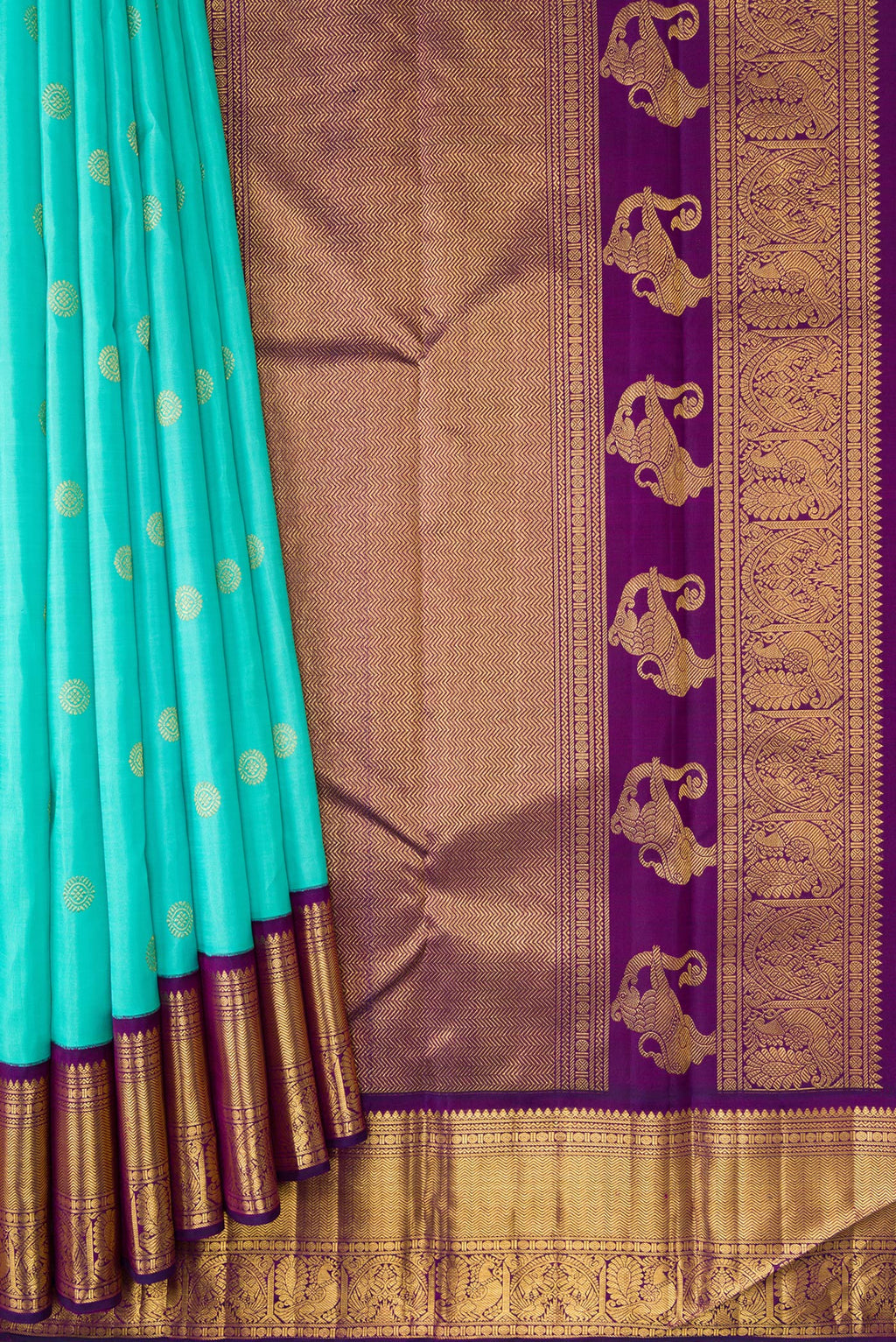 Pleats and pallu of Sky Blue Dual Tone Kanchipuram Silk Saree with Zari Butta on the body and Zari Border. 