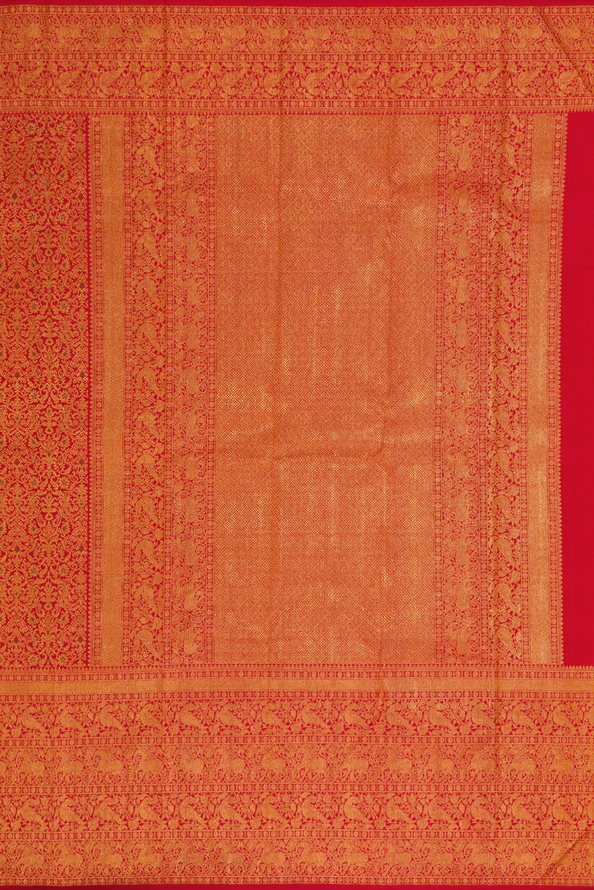 Close up image of the pallu of Red Dual Tone Kanchipuram Silk Saree with Zari Brocade on the body and Zari Border. 