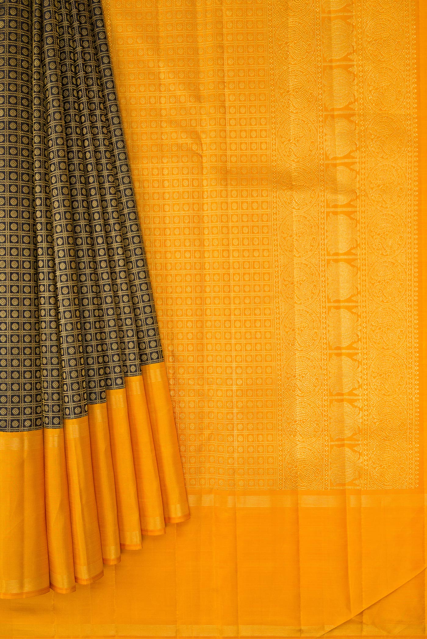Pleats and pallu of Black Dual Tone Kanchipuram Silk Saree with Zari Brocade on the body and Zari Border. 