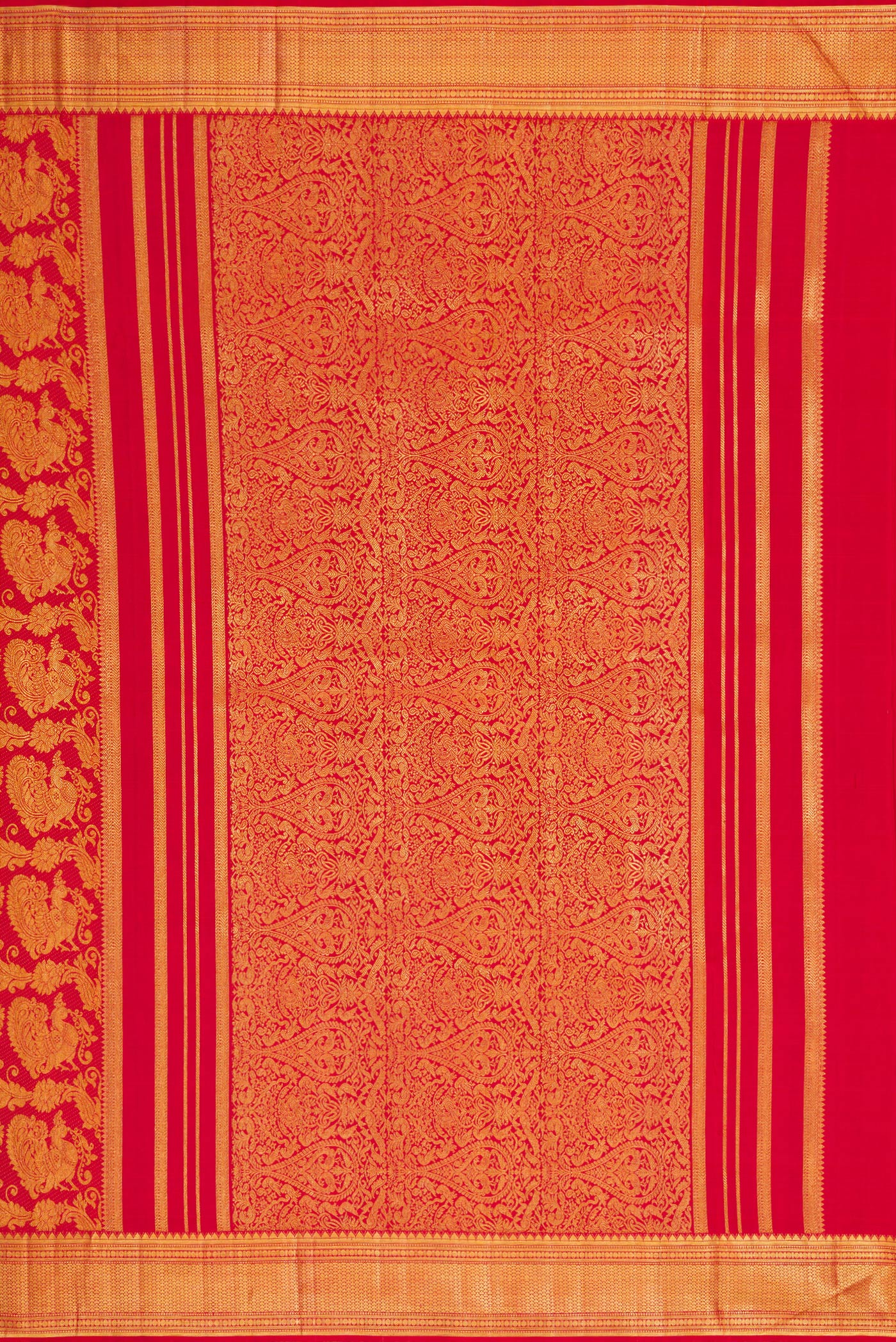 Close up image of the pallu of Maroon Dual Tone Kanchipuram Silk Saree with Zari Brocade on the body and Zari Border. 