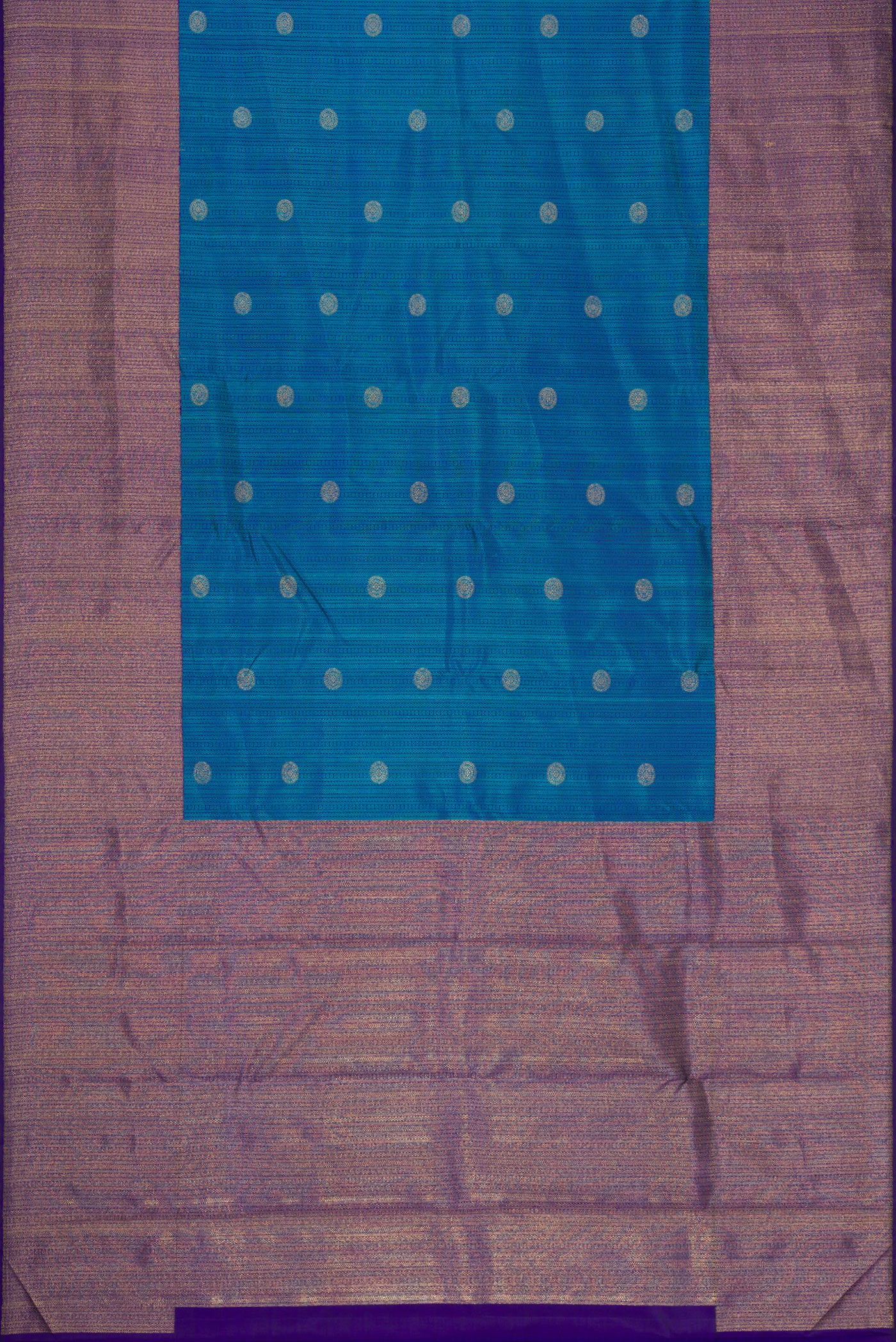 Flat view of Peacock Blue Dual Tone Kanchipuram Silk Saree with Jacquard With Zari Butta on the body and Zari Border. 