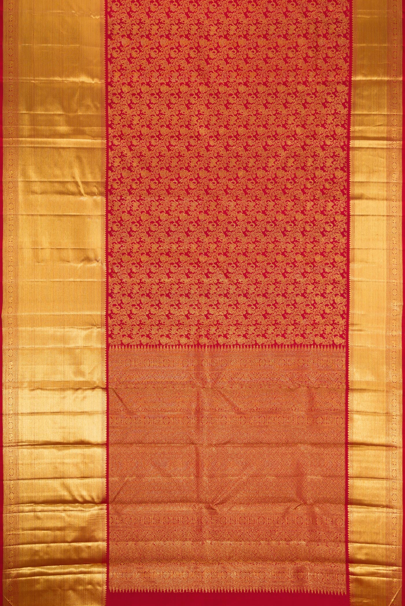 Flat view of Red Dual Tone Kanchipuram Silk Saree with Zari Brocade on the body and Zari Border. 