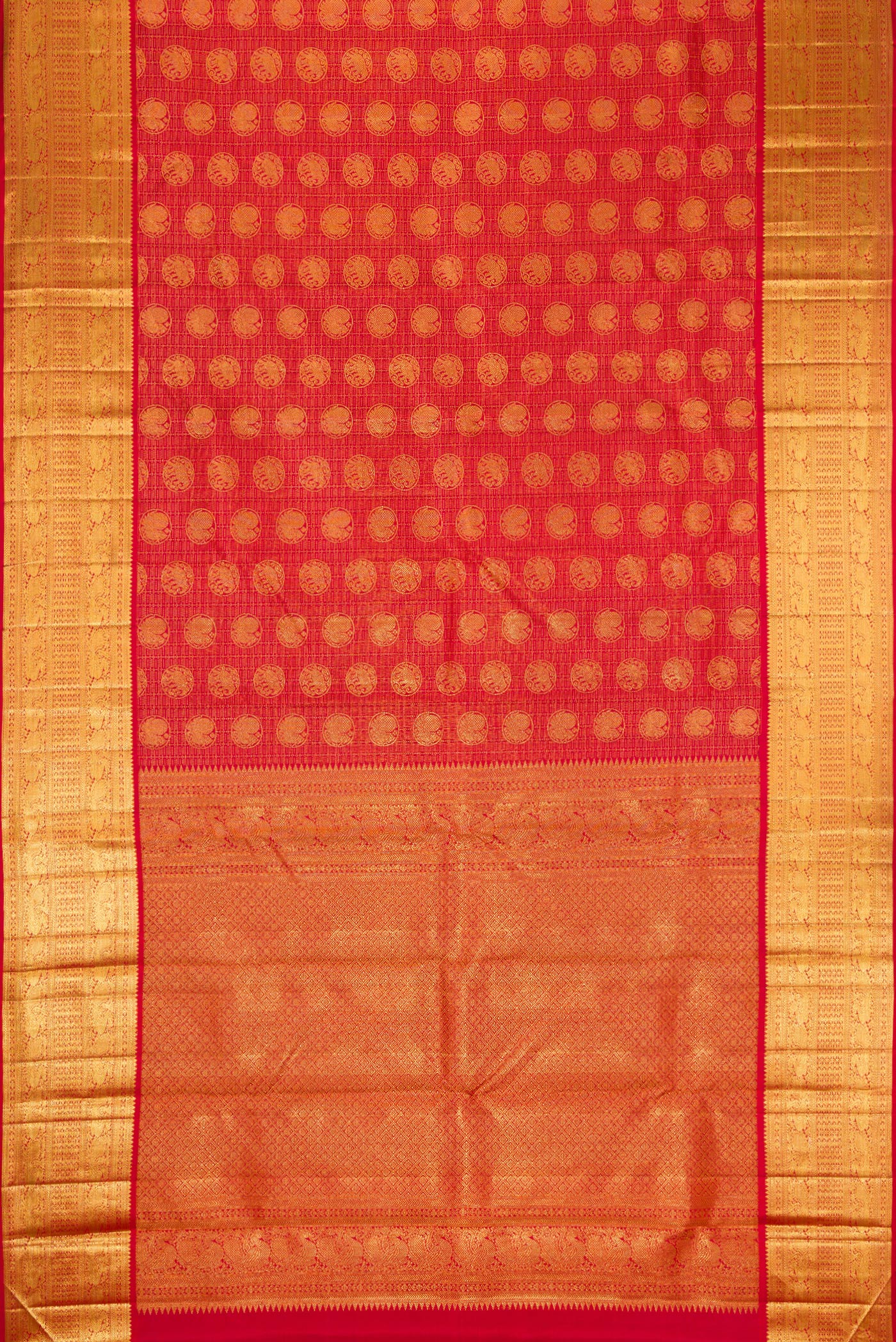 Flat view of Maroon Dual Tone Kanchipuram Silk Saree with Zari Brocade on the body and Zari Border. 