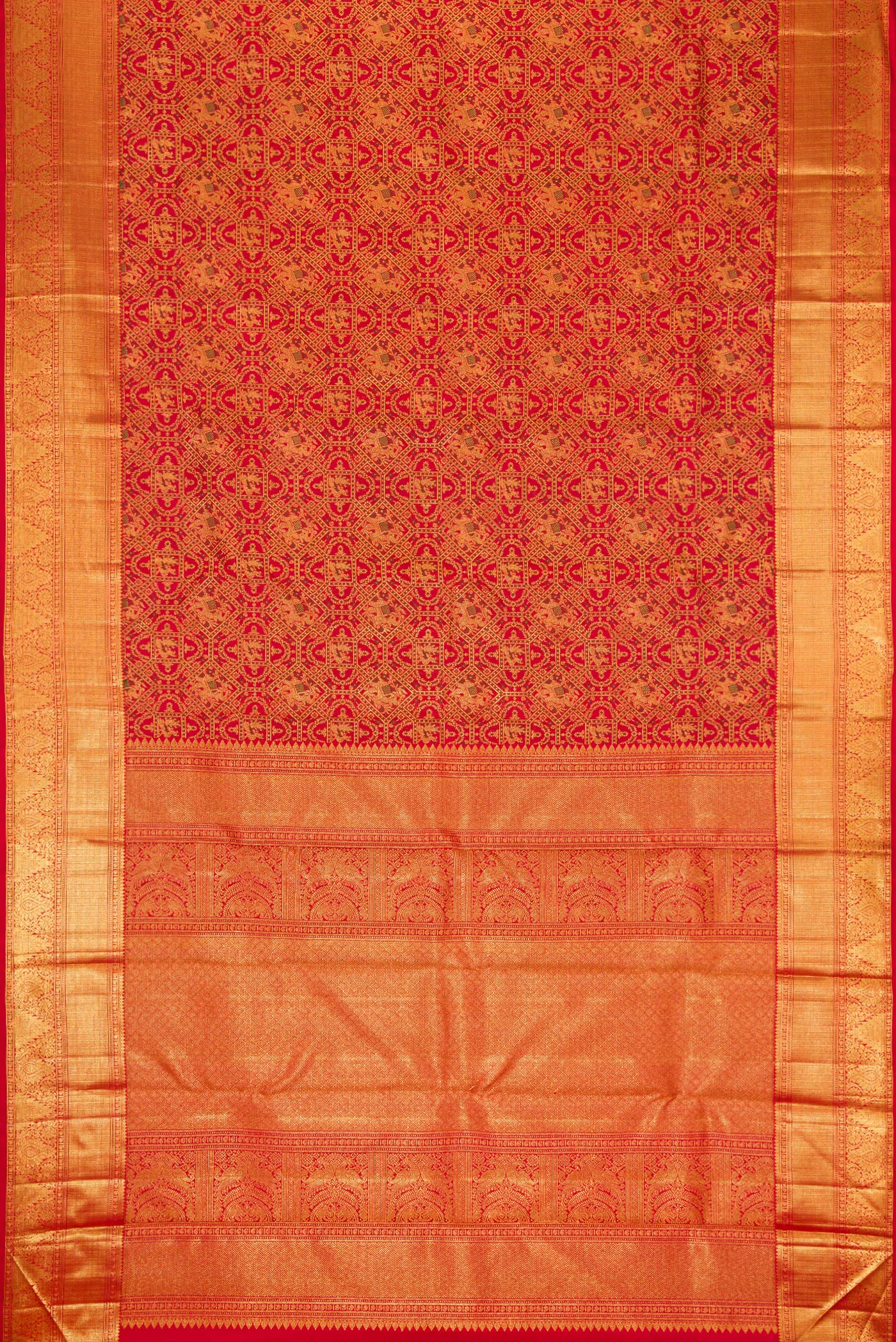 Flat view of Red Dual Tone Kanchipuram Silk Saree with Zari Brocade on the body and Zari Border. 