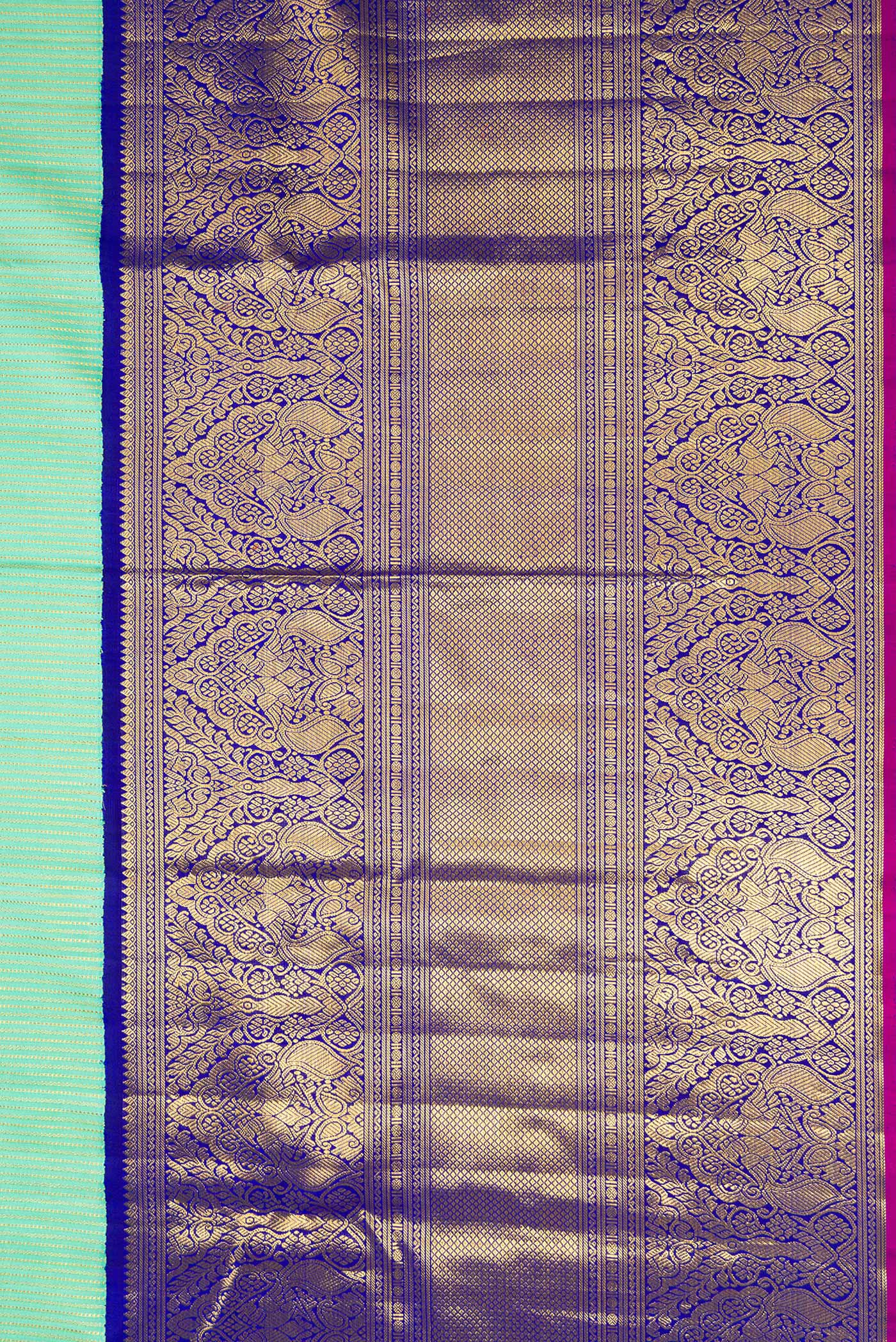 Border image of Pista Green Dual Tone Kanchipuram Silk Saree with Zari Brocade on the body and Zari Border. 