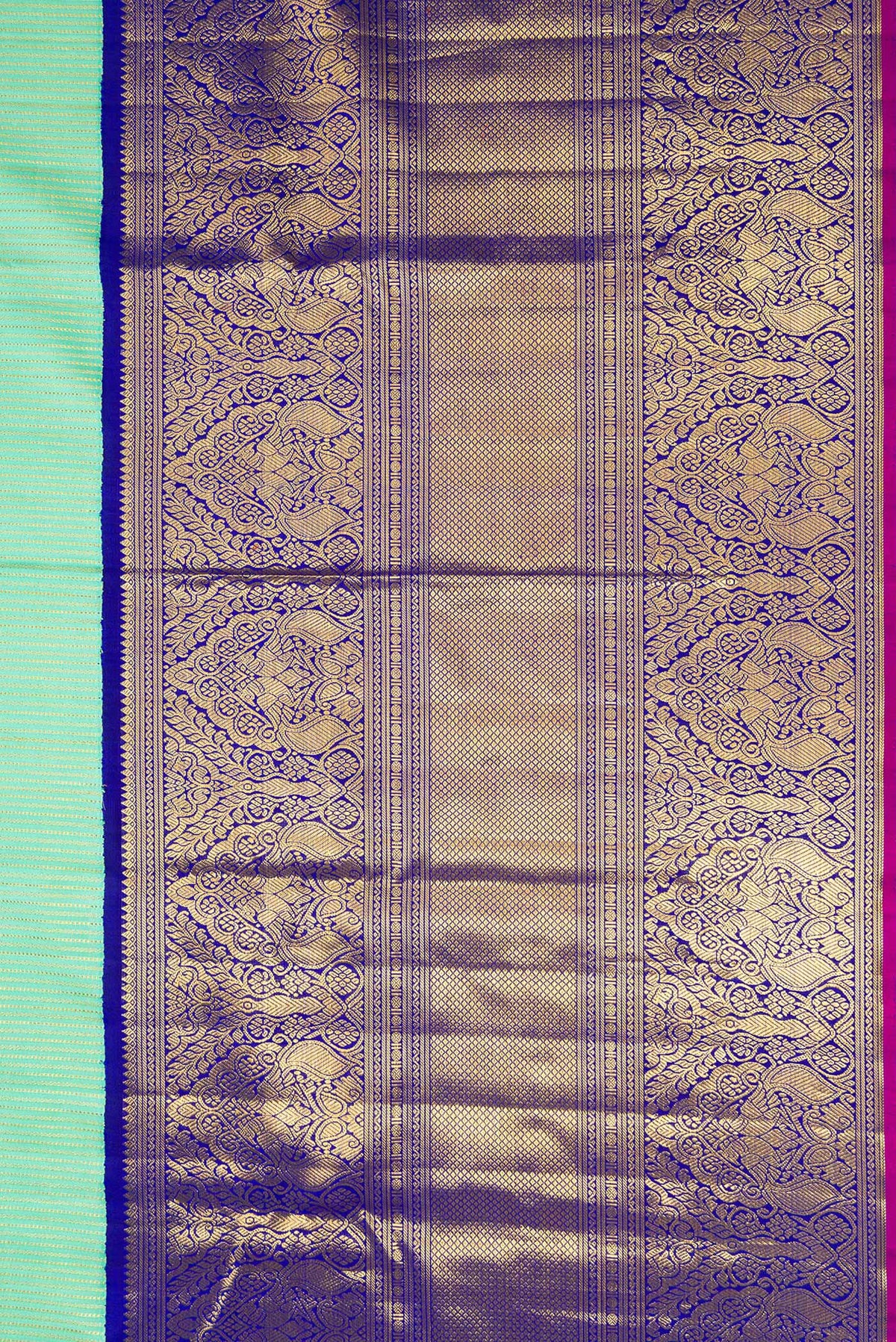 Border image of Pista Green Dual Tone Kanchipuram Silk Saree with Zari Brocade on the body and Zari Border. 