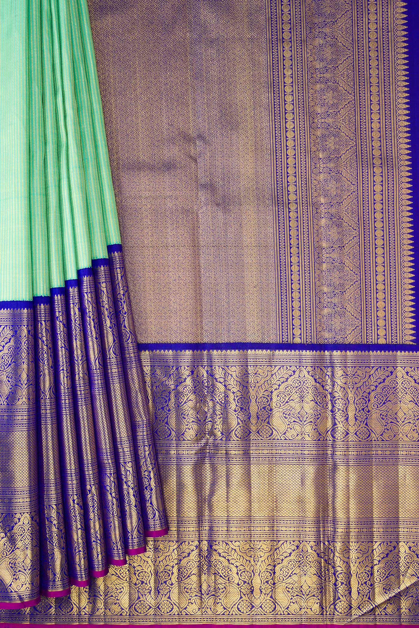 Pleats and pallu of Pista Green Dual Tone Kanchipuram Silk Saree with Zari Brocade on the body and Zari Border. 