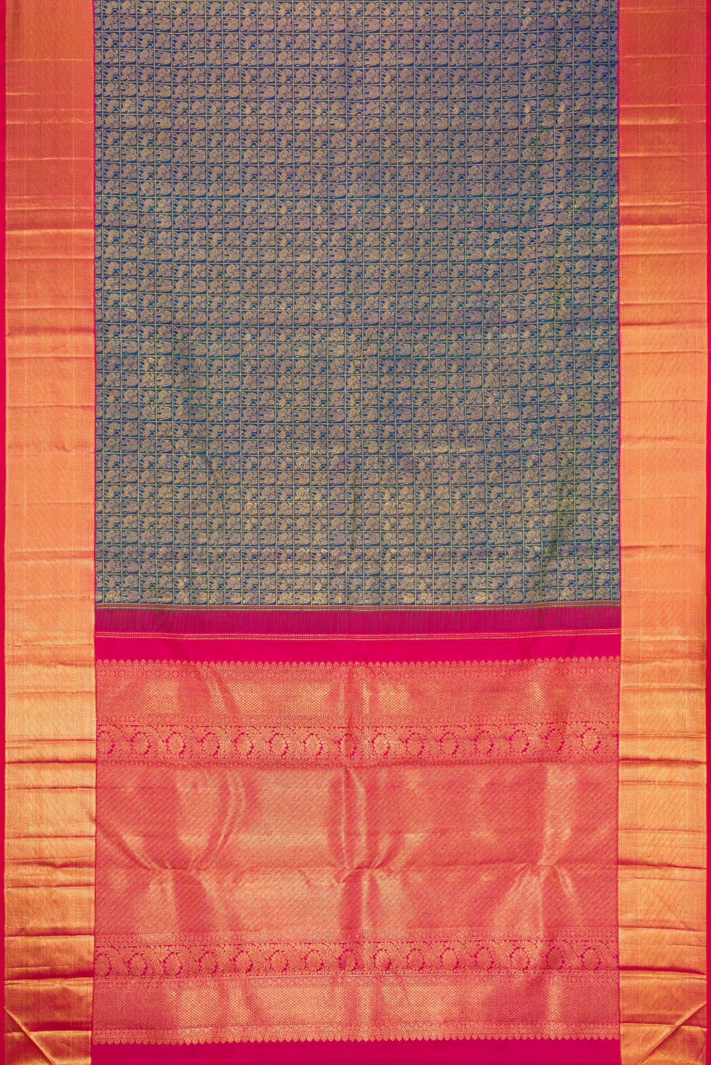 Flat view of Peacock Blue Dual Tone Kanchipuram Silk Saree with Zari Brocade on the body and Zari Border. 