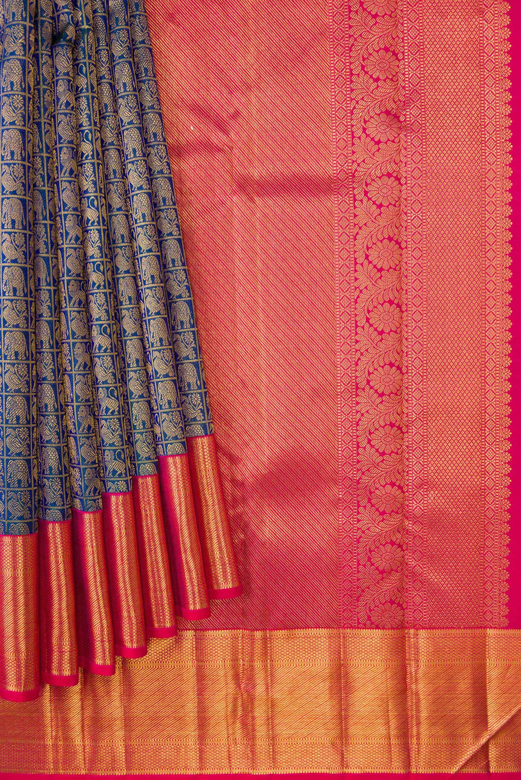 Pleats and pallu of Peacock Blue Dual Tone Kanchipuram Silk Saree with Zari Brocade on the body and Zari Border. 