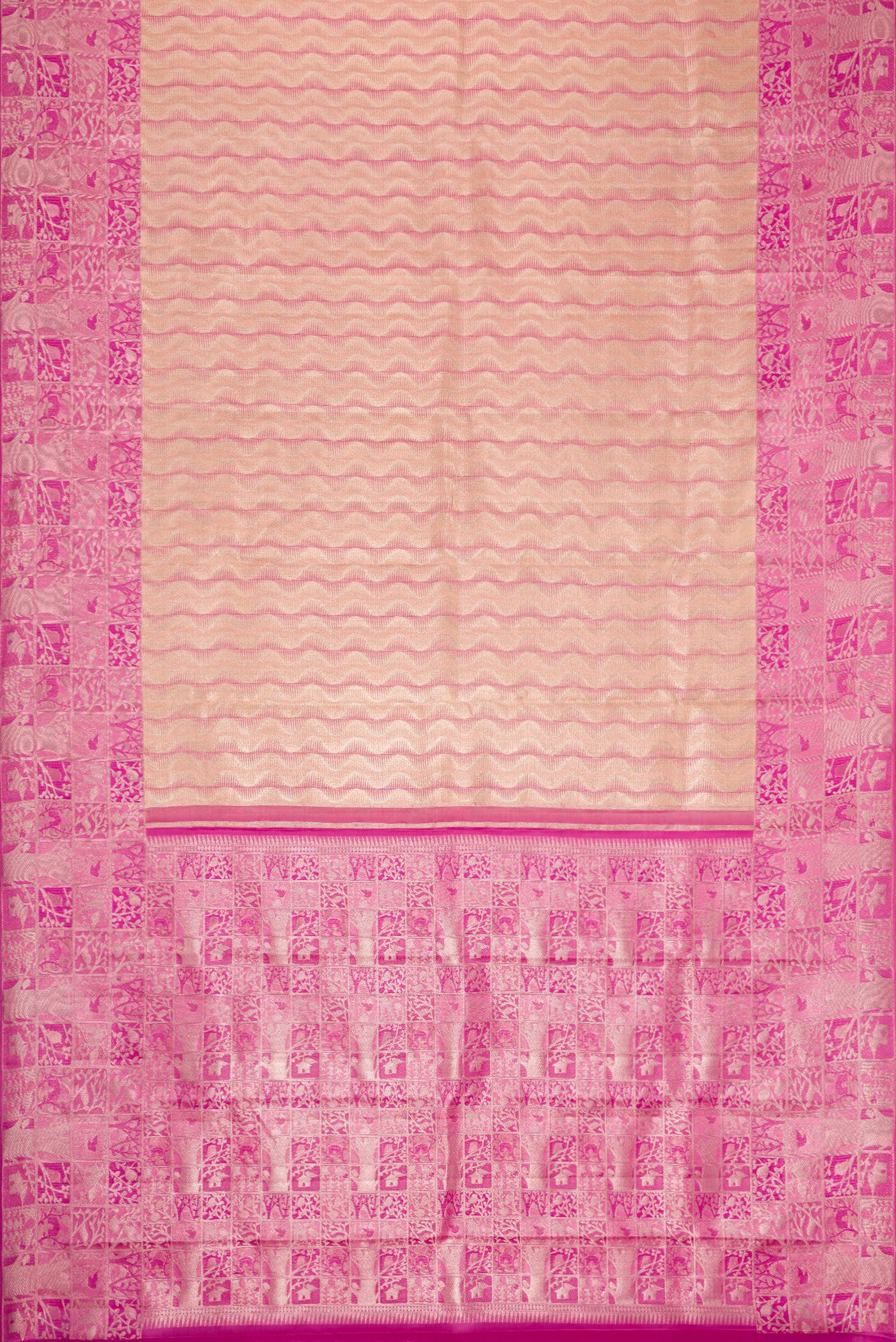 Flat view of Golden Peach Dual Tone Kanjivaram Tissue Silk Saree with Zari Brocade on the body and Zari Border. 