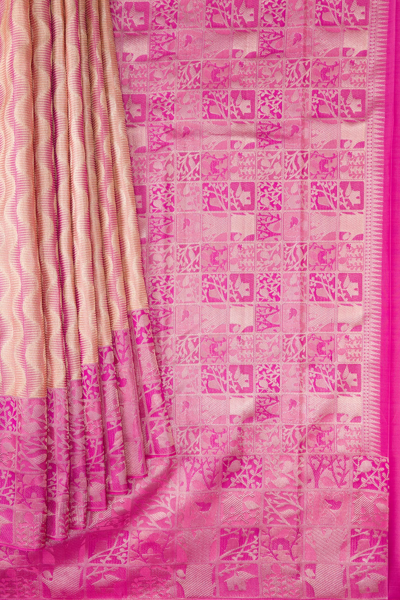 Pleats and pallu of Golden Peach Dual Tone Kanjivaram Tissue Silk Saree with Zari Brocade on the body and Zari Border. 