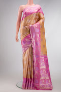 Gold Dual Tone Kanjivaram Tissue Silk Saree with Zari Brocade on the body and Fancy Border.  displayed on a mannequin