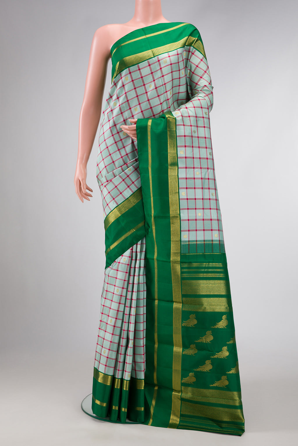 Pure Silk Pure Zari Sky Blue Dual Tone Kanjivaram Saree with Checked design on the body and Zari Border.  displayed on a mannequin