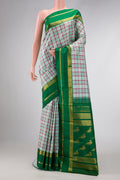 Pure Silk Pure Zari Sky Blue Dual Tone Kanjivaram Saree with Checked design on the body and Zari Border.  displayed on a mannequin