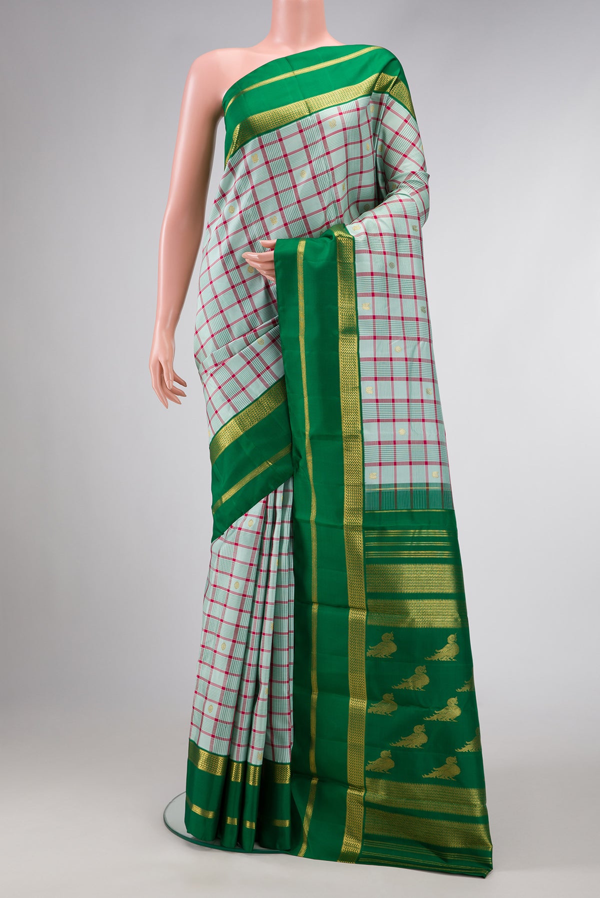 Pure Silk Pure Zari Sky Blue Dual Tone Kanjivaram Saree with Checked design on the body and Zari Border.  displayed on a mannequin