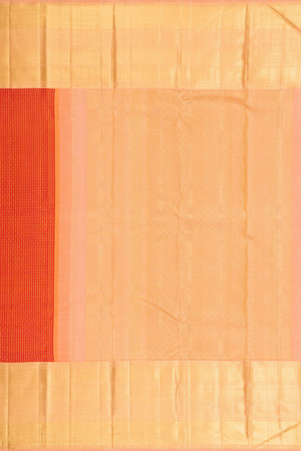 Close up image of the pallu of Brick Orange Dual Tone Kanchipuram Silk Saree with Zari Brocade on the body and Zari Border. 