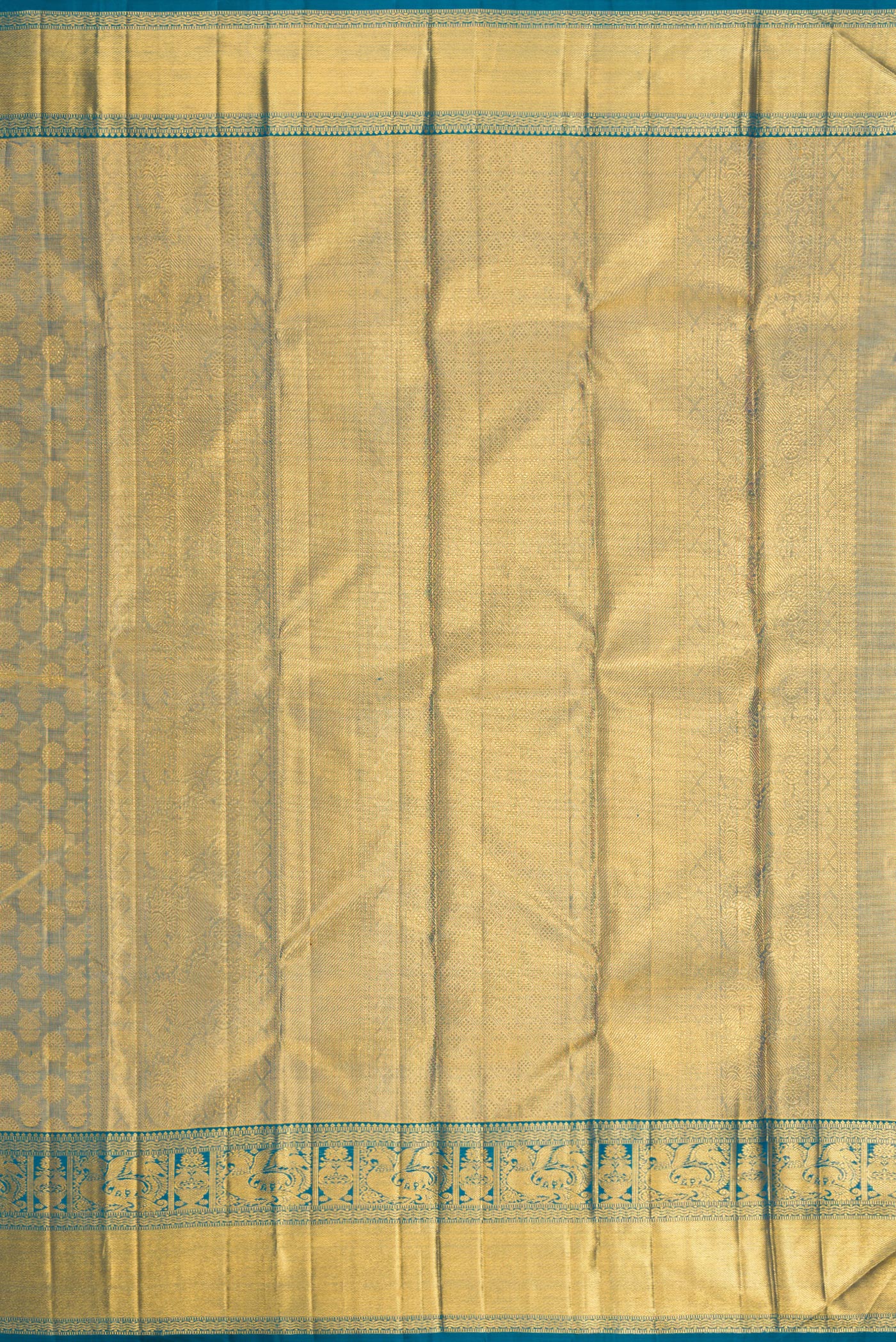 Close up image of the pallu of Maya Blue Dual Tone Kanchipuram Tissue Silk Saree with Zari Brocade on the body and Zari Border. 