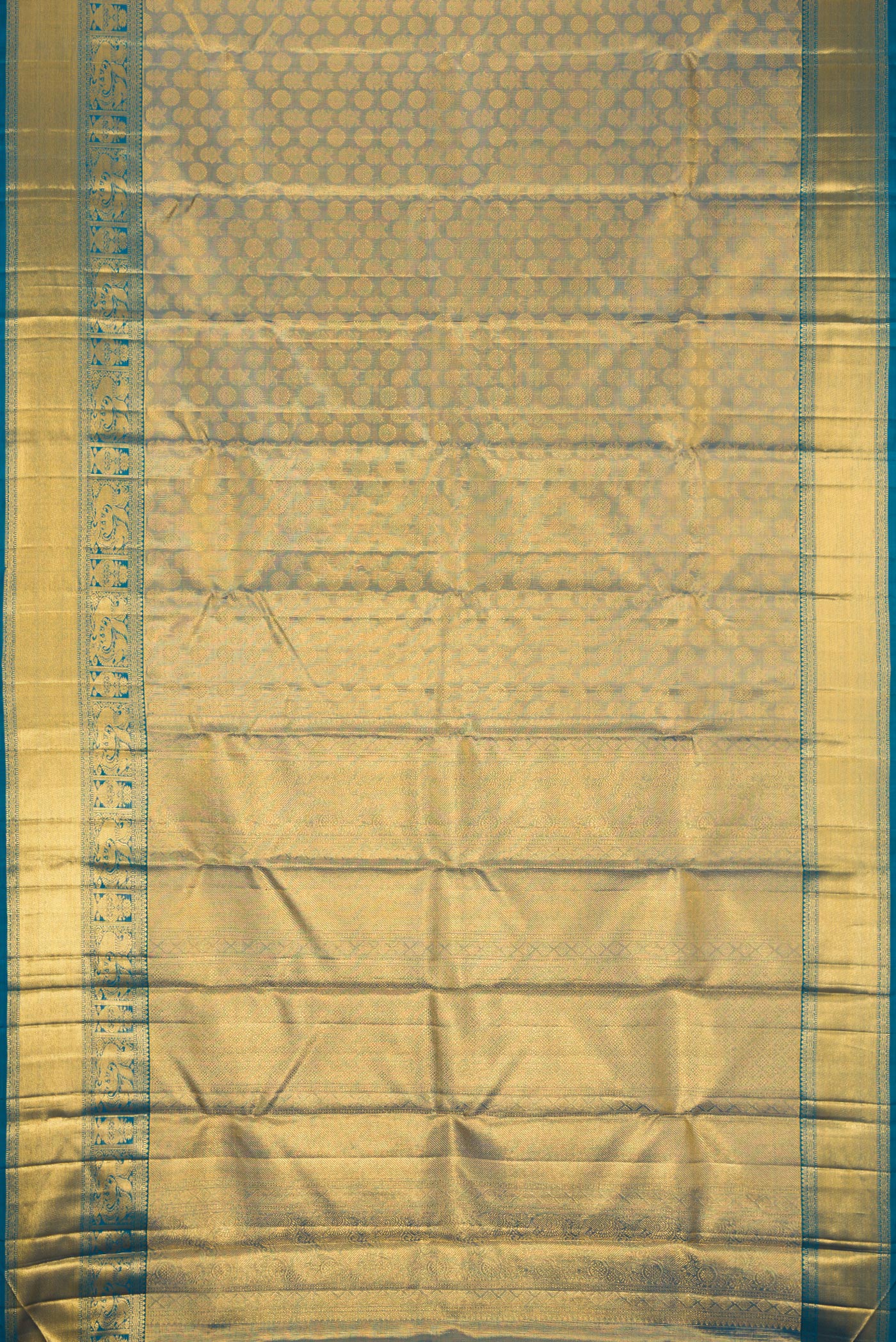 Flat view of Maya Blue Dual Tone Kanchipuram Tissue Silk Saree with Zari Brocade on the body and Zari Border. 