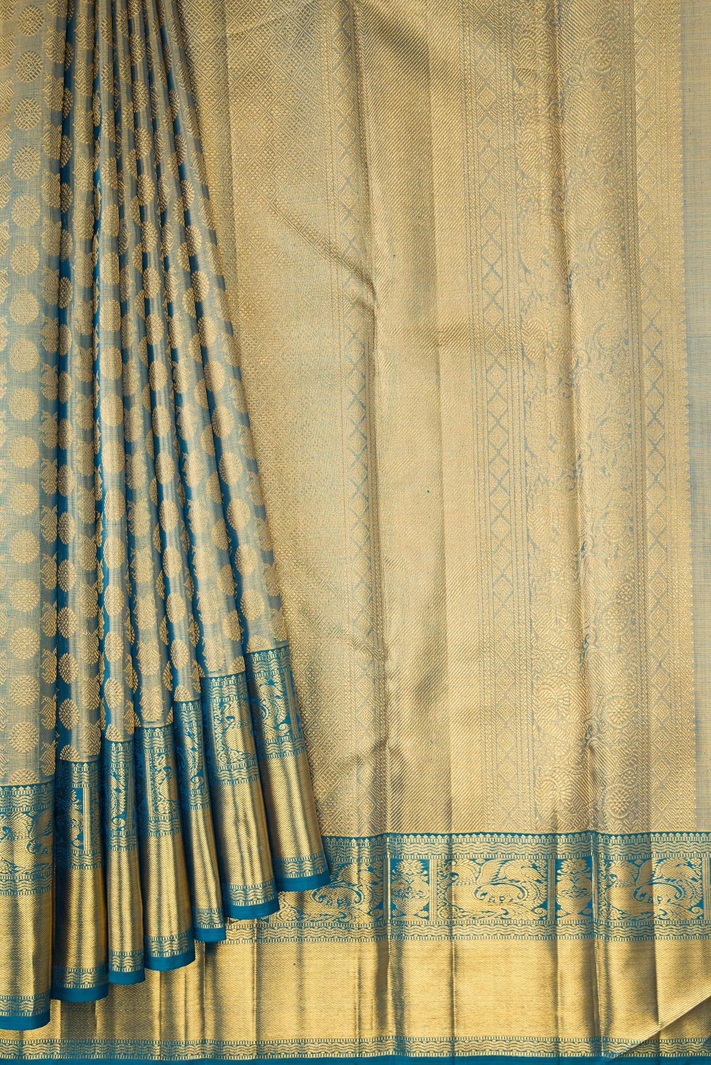 Pleats and pallu of Maya Blue Dual Tone Kanchipuram Tissue Silk Saree with Zari Brocade on the body and Zari Border. 