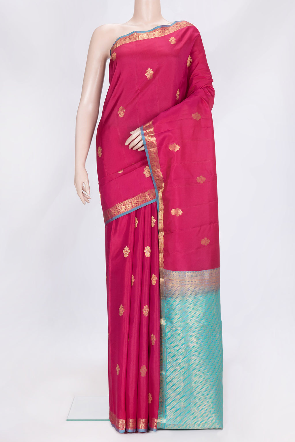 Pink Dual Tone Kanchipuram Silk Saree with Zari Butta on the body and Zari Border.  displayed on a mannequin