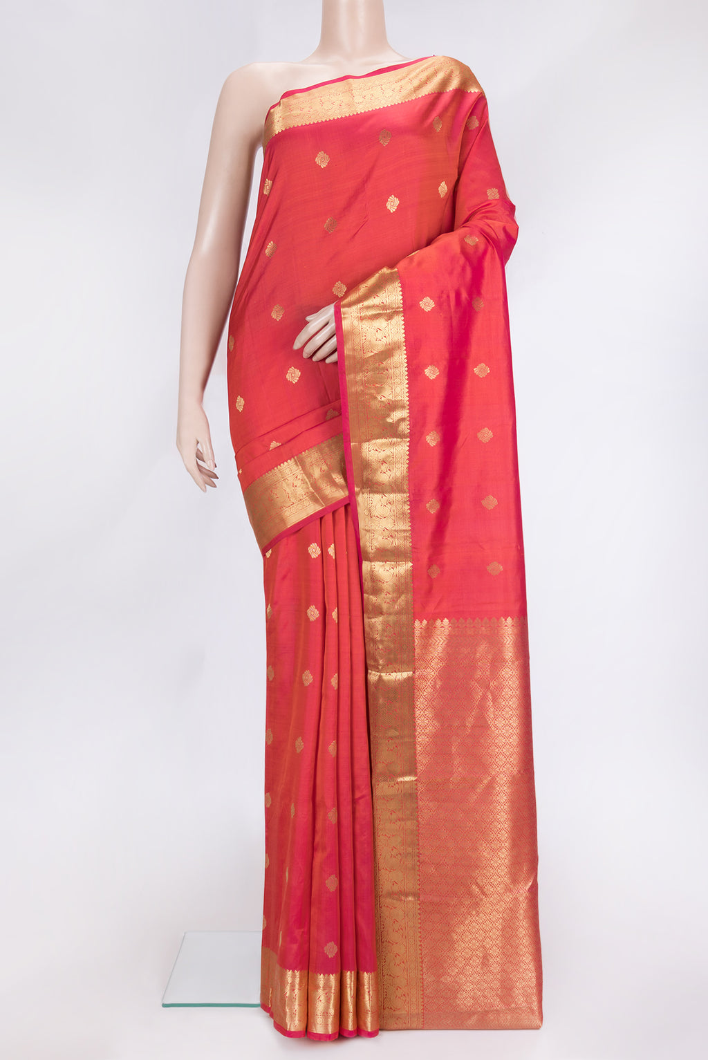 Pink Dual Tone Kanchipuram Silk Saree with Zari Butta on the body and Zari Border.  displayed on a mannequin