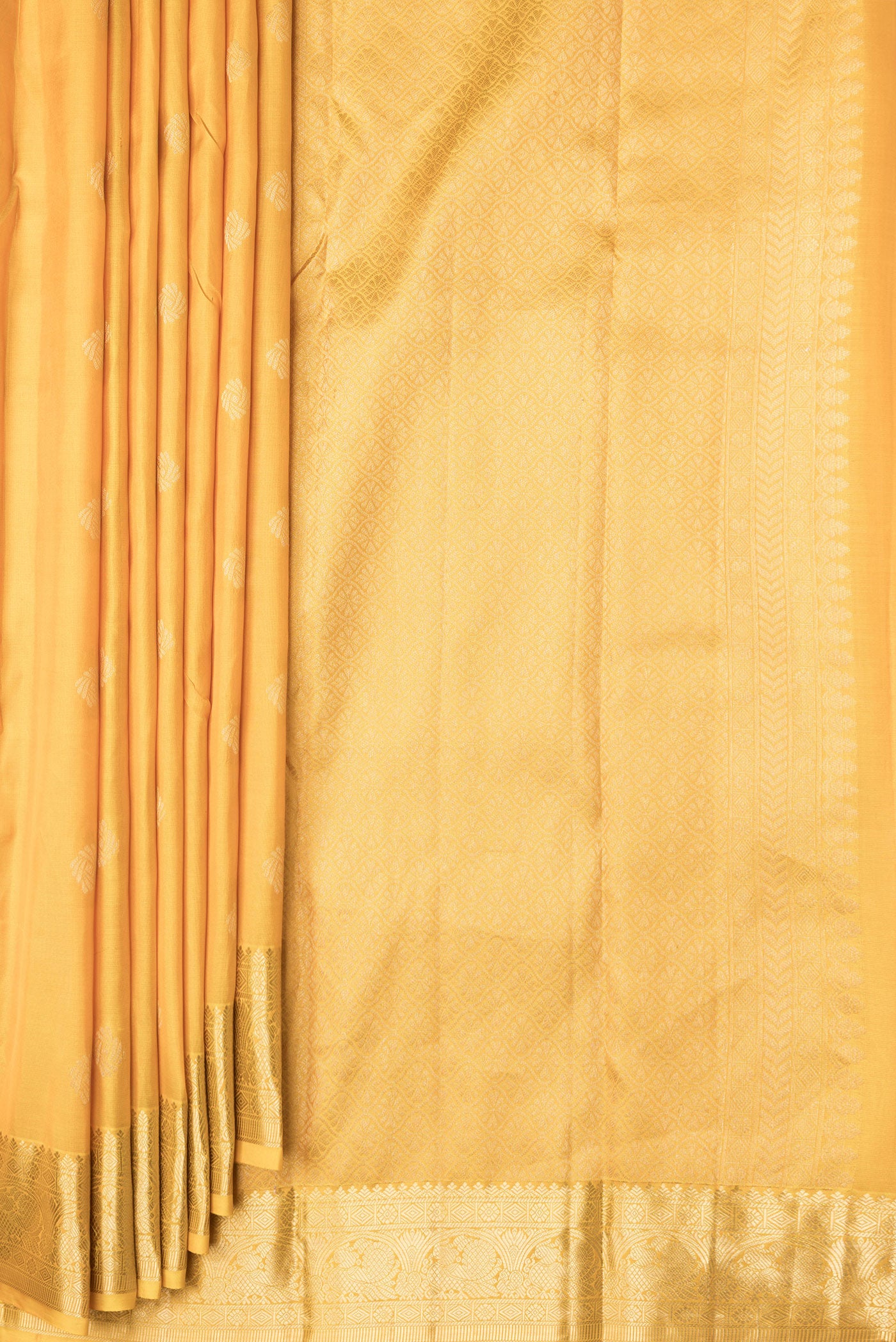 Pleats and pallu of Mustard Dual Tone Kanchipuram Silk Saree with Zari Butta on the body and Zari Border. 
