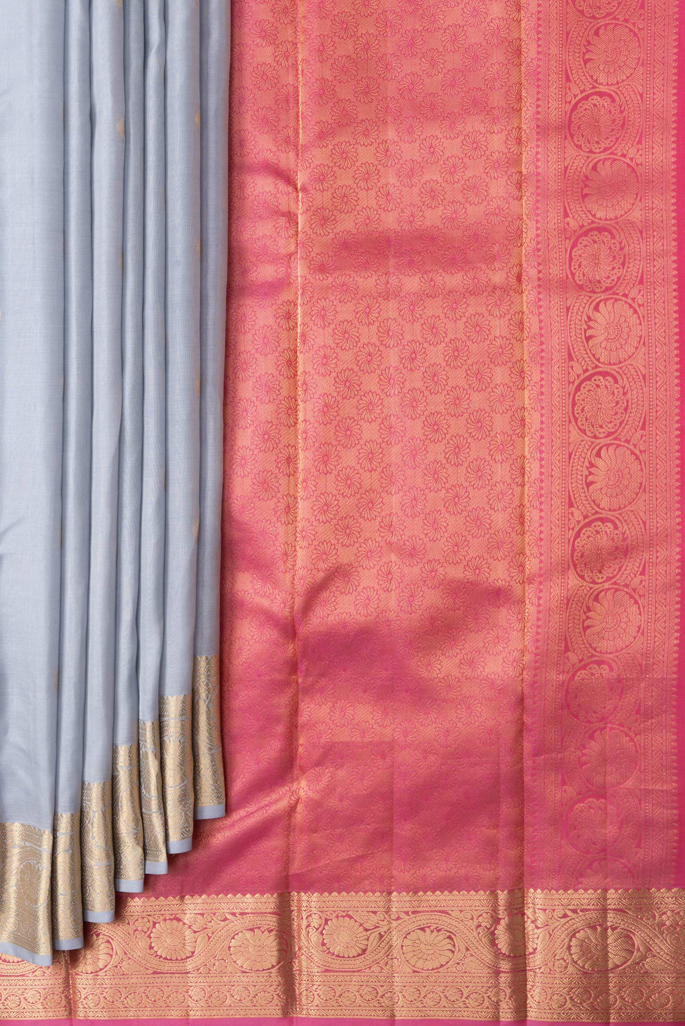 Pleats and pallu of Grey Dual Tone Kanchipuram Silk Saree with Zari Butta on the body and Zari Border. 