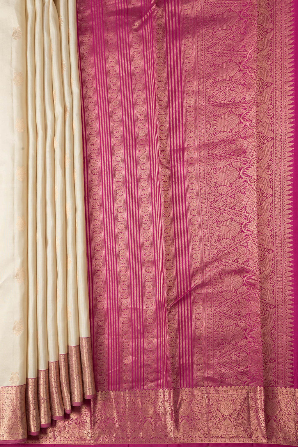 Pleats and pallu of Beige Dual Tone Kanchipuram Silk Saree with Zari Butta on the body and Zari Border. 