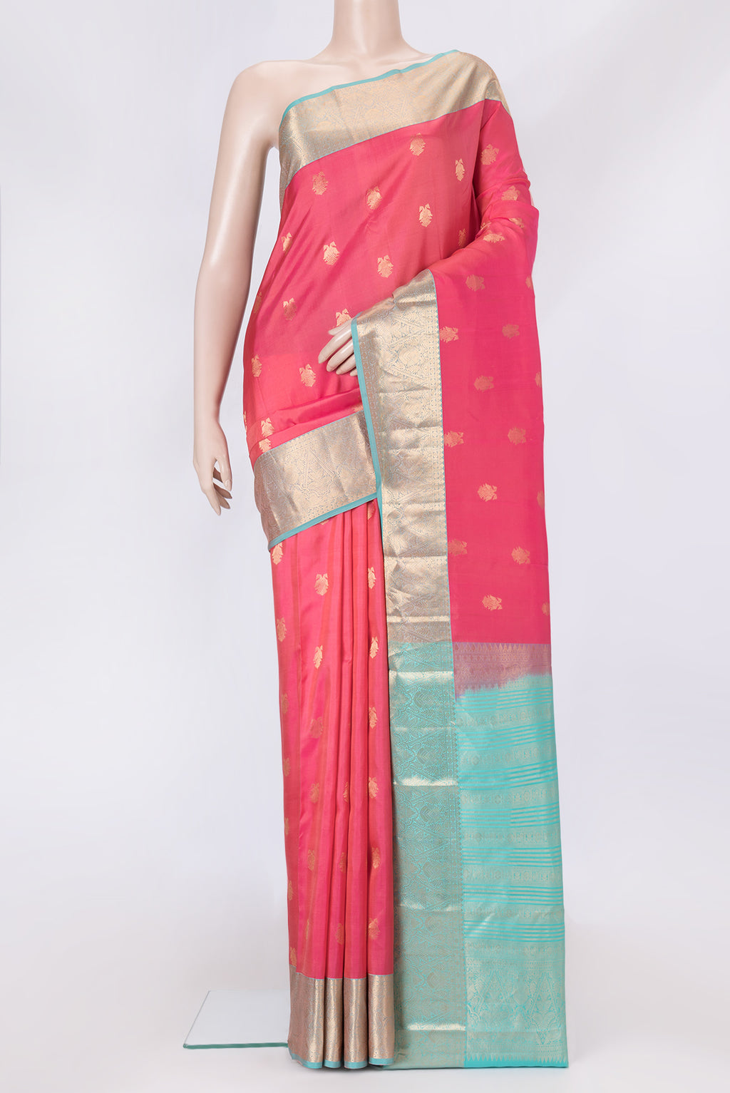 Pink Dual Tone Kanchipuram Silk Saree with Zari Butta on the body and Zari Border.  displayed on a mannequin