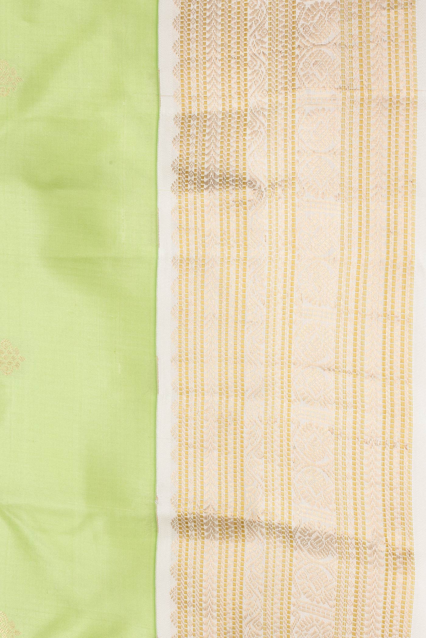 Border image of Pista Green Dual Tone Kanchipuram Silk Saree with Zari Butta on the body and Zari Border. 