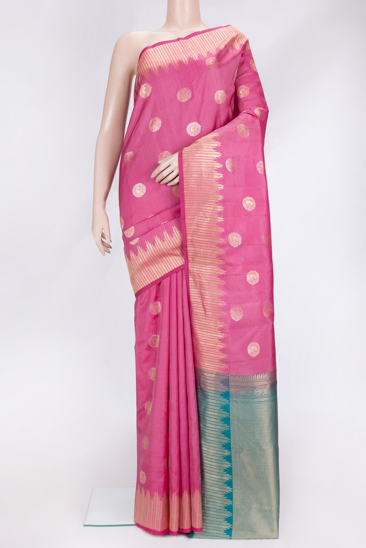 Pink Dual Tone Kanjivaram Silk Saree with Zari Butta on the body and Zari Border.  displayed on a mannequin