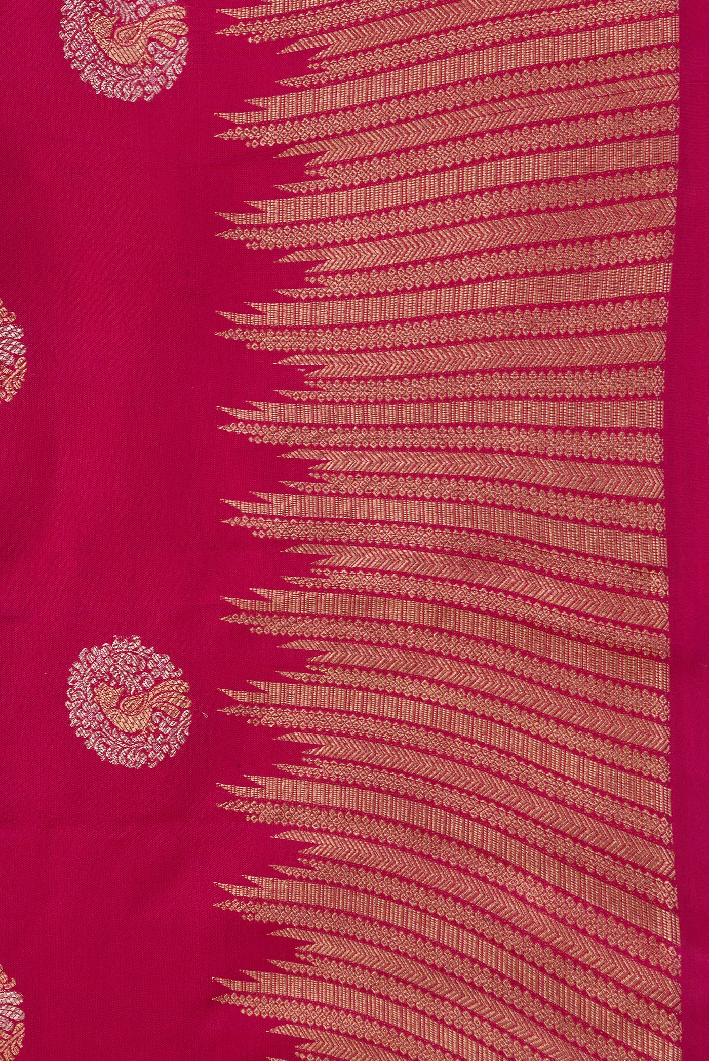 Border image of Dark Pink Dual Tone Kanjivaram Silk Saree with Zari Butta on the body and Fancy Border. 